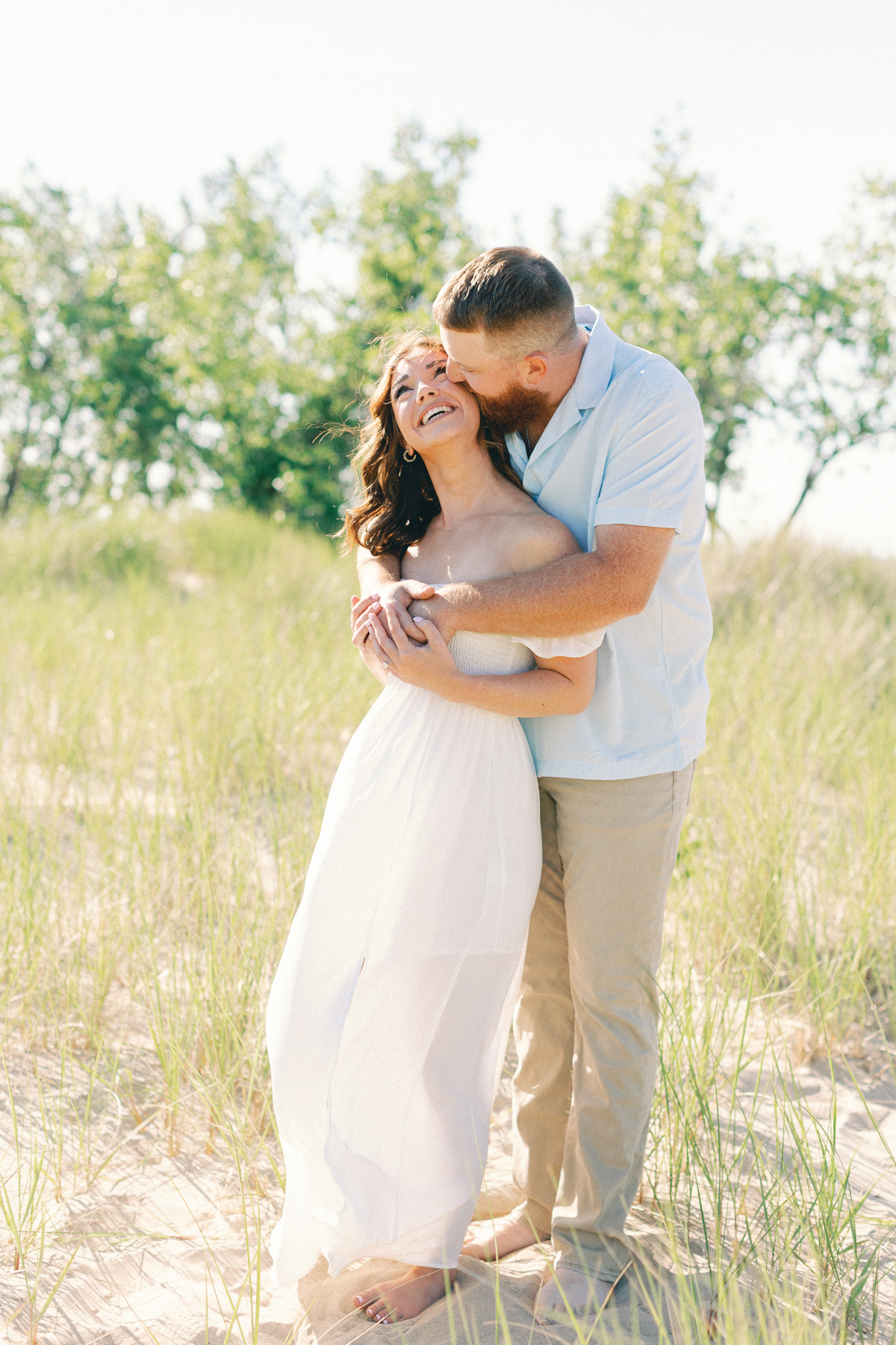 couple holding and laughing