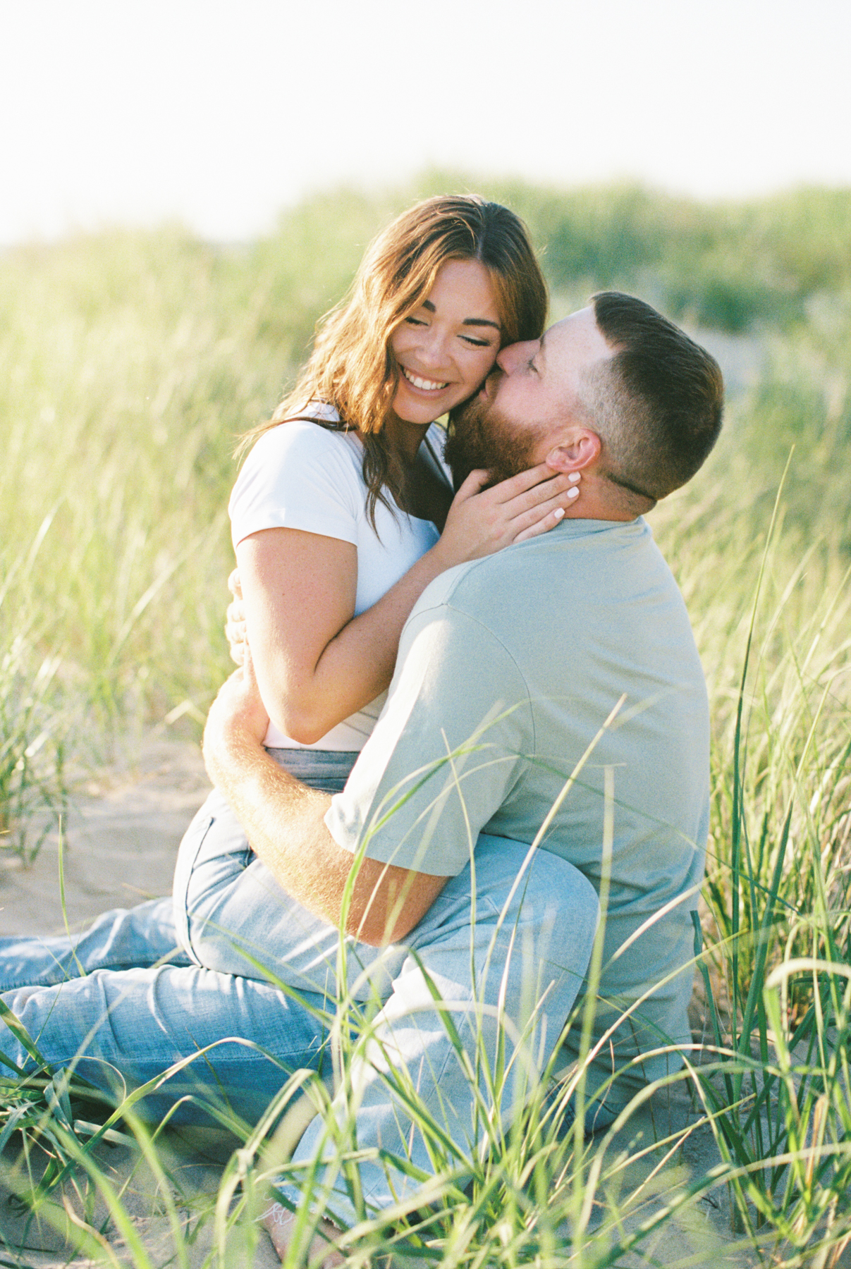 couple sitting in grass