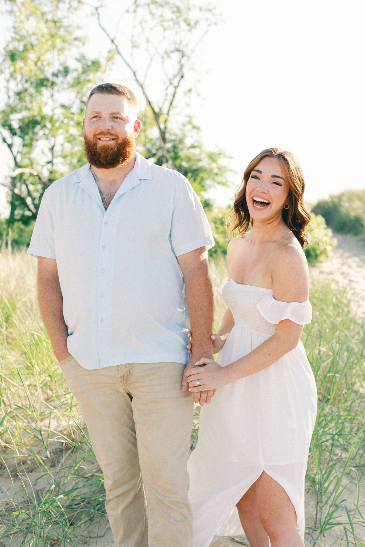 couple laughing at camera