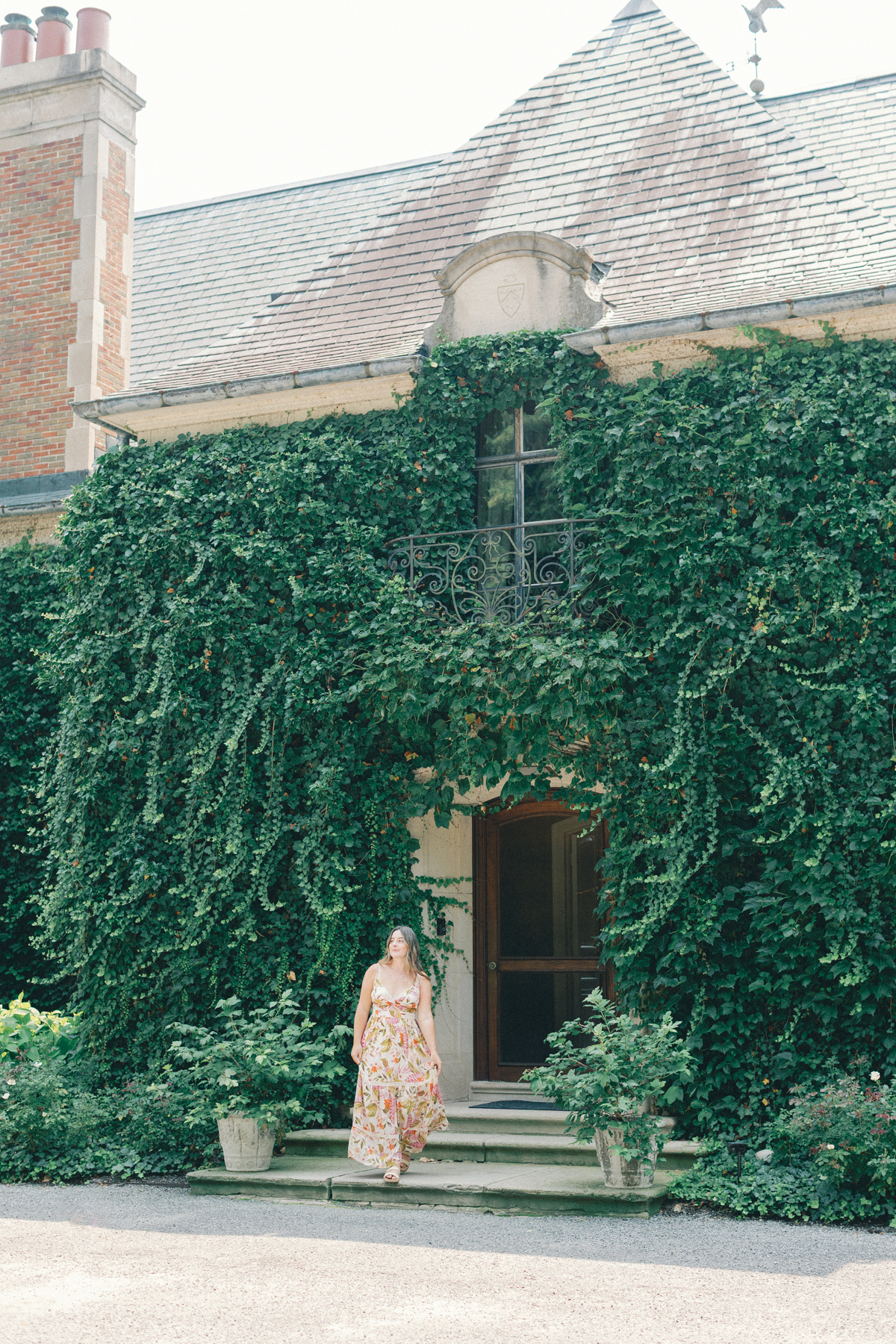 Photographer walking in front of venue