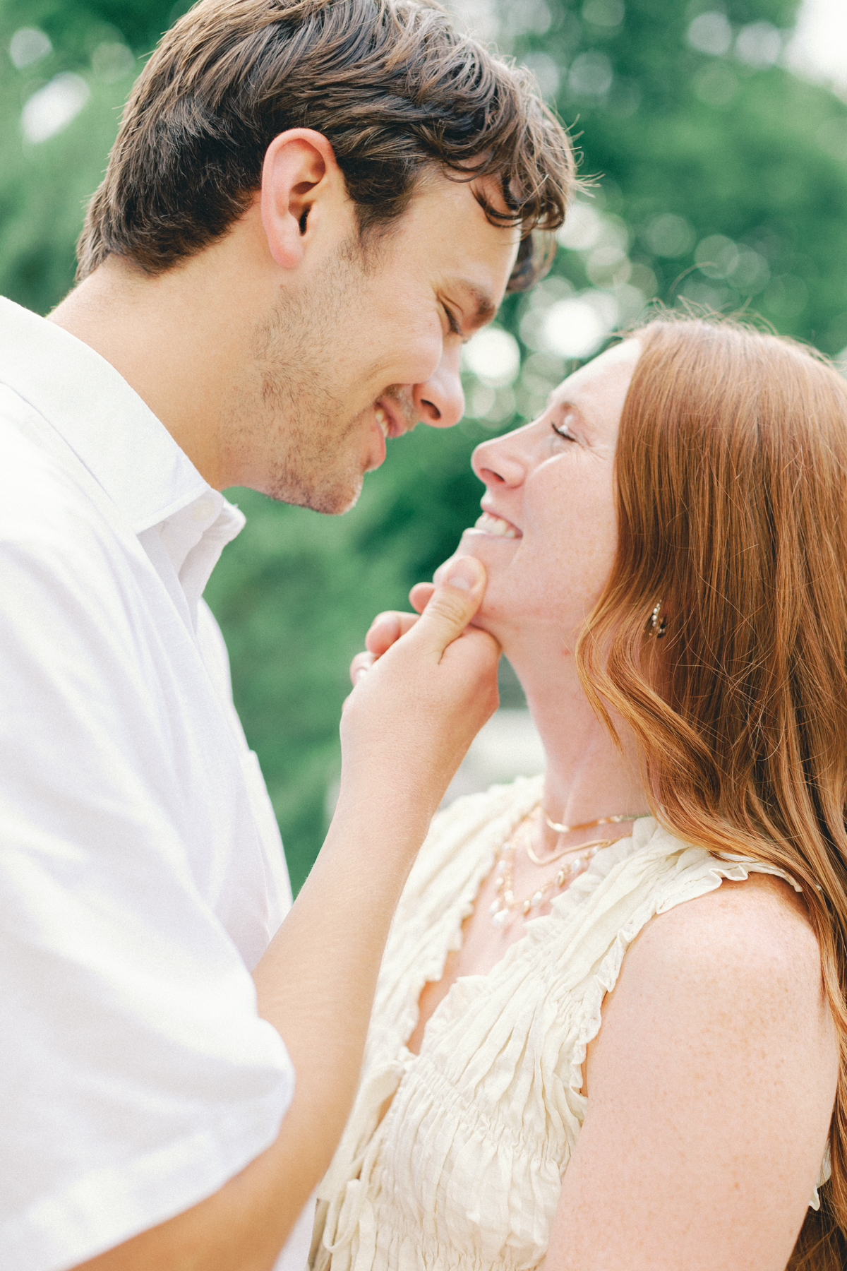  him grabbing her chin up close