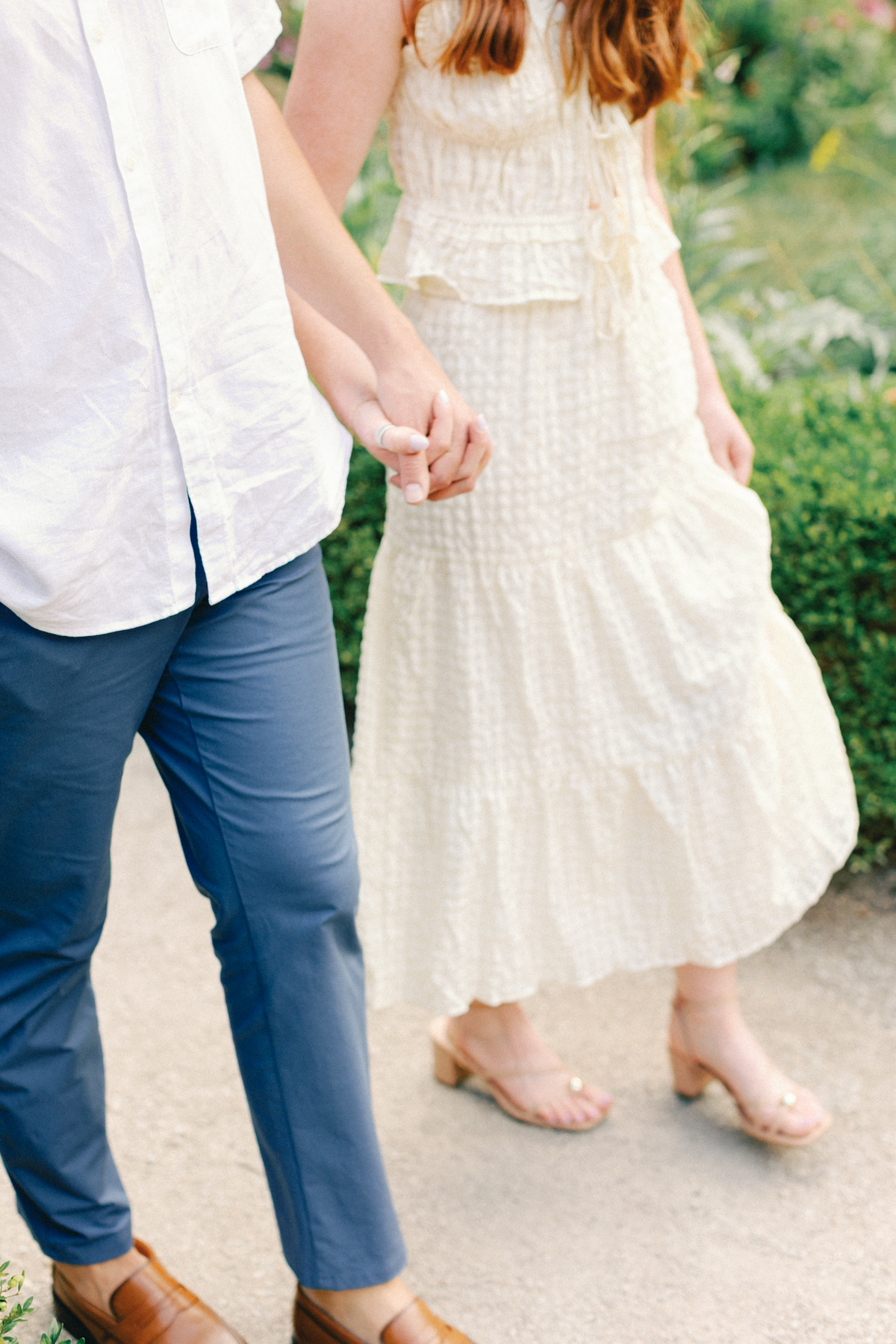  couples hands while walking