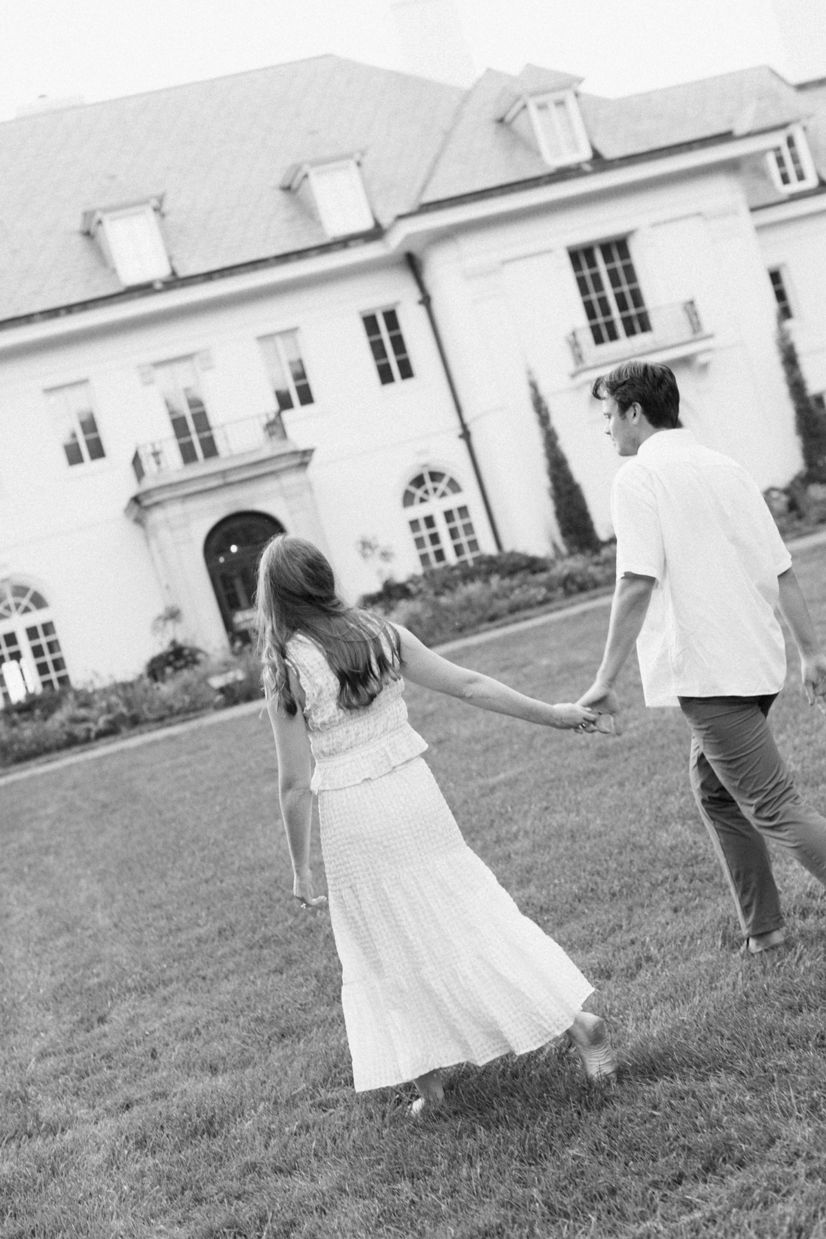  Black and white photo of couple walking