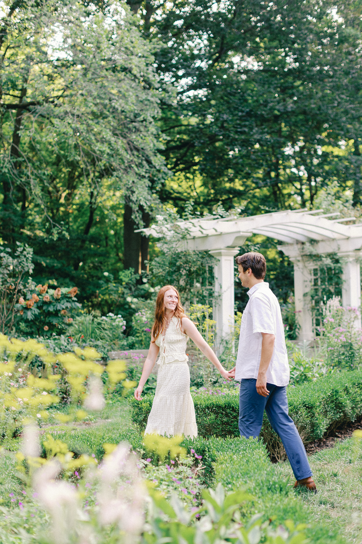  couple walking in the garden