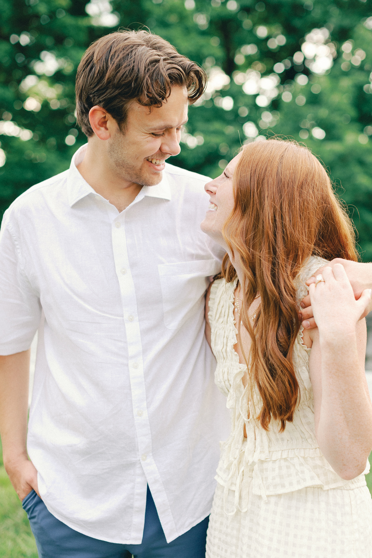  couple laughing and walking