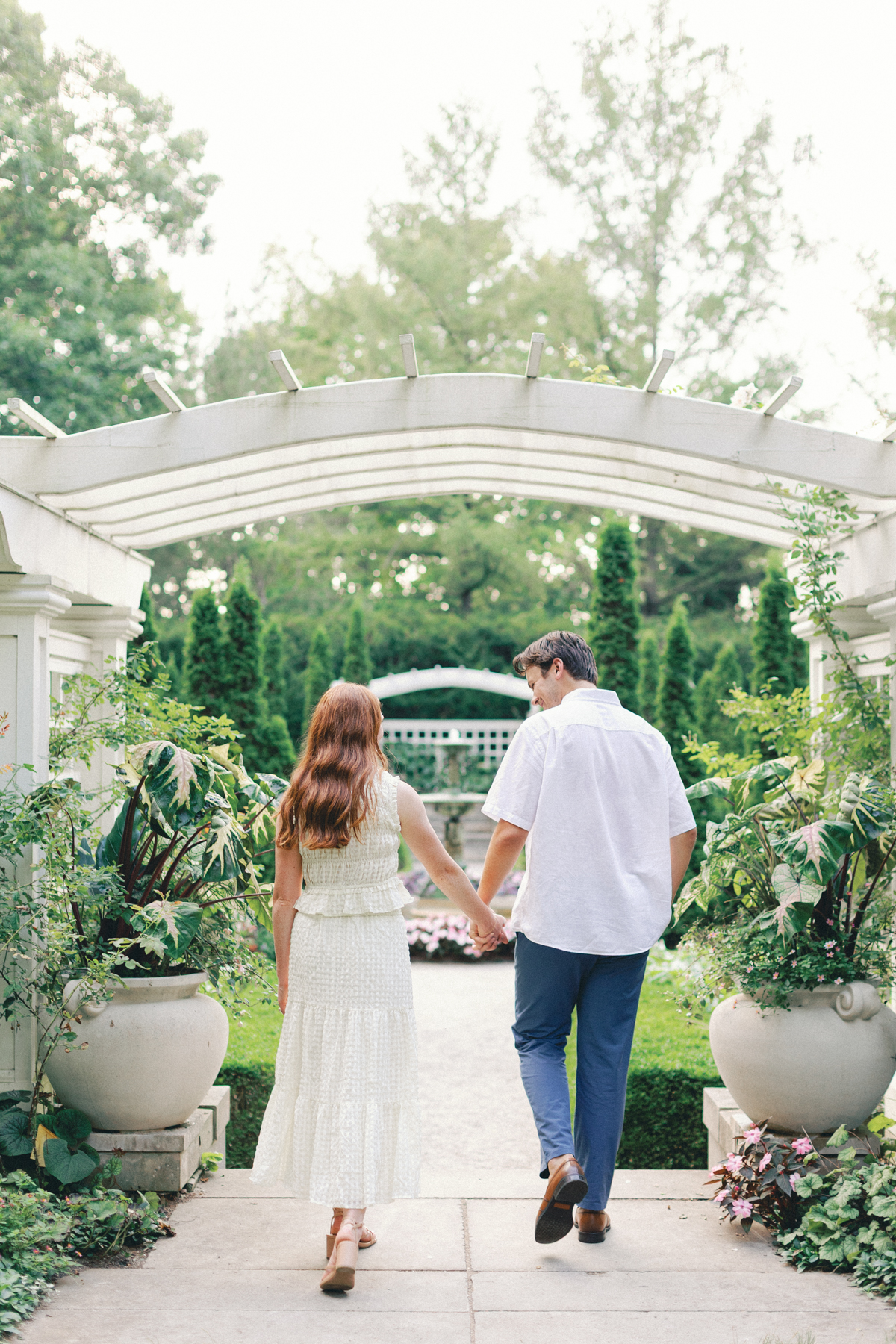  couple walking into garden
