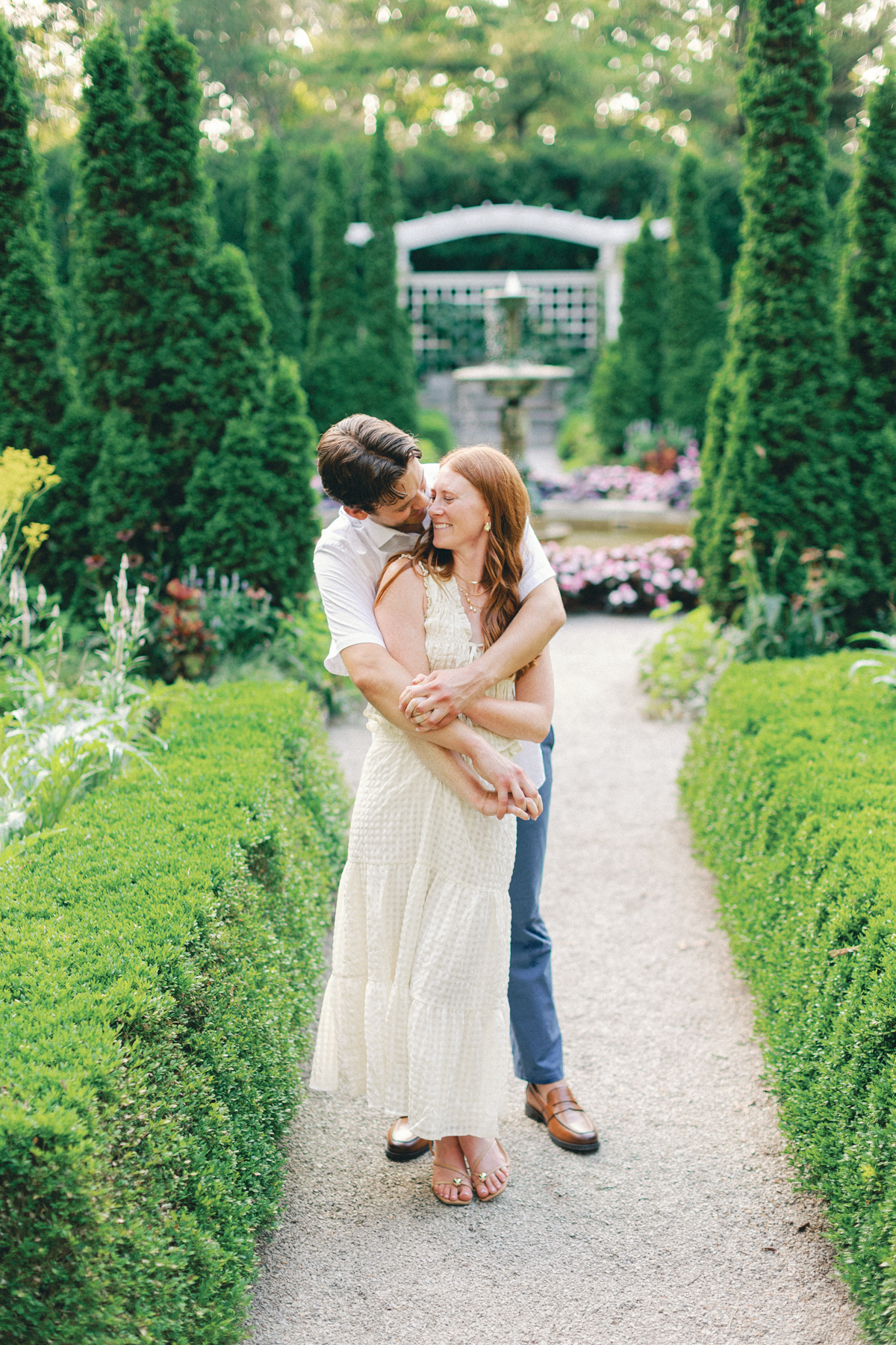 Couple snuggled in the Garden
