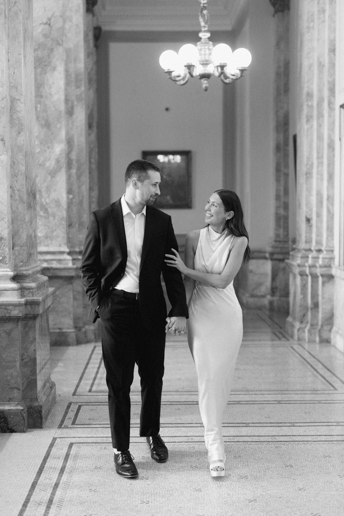 Couple walking in library