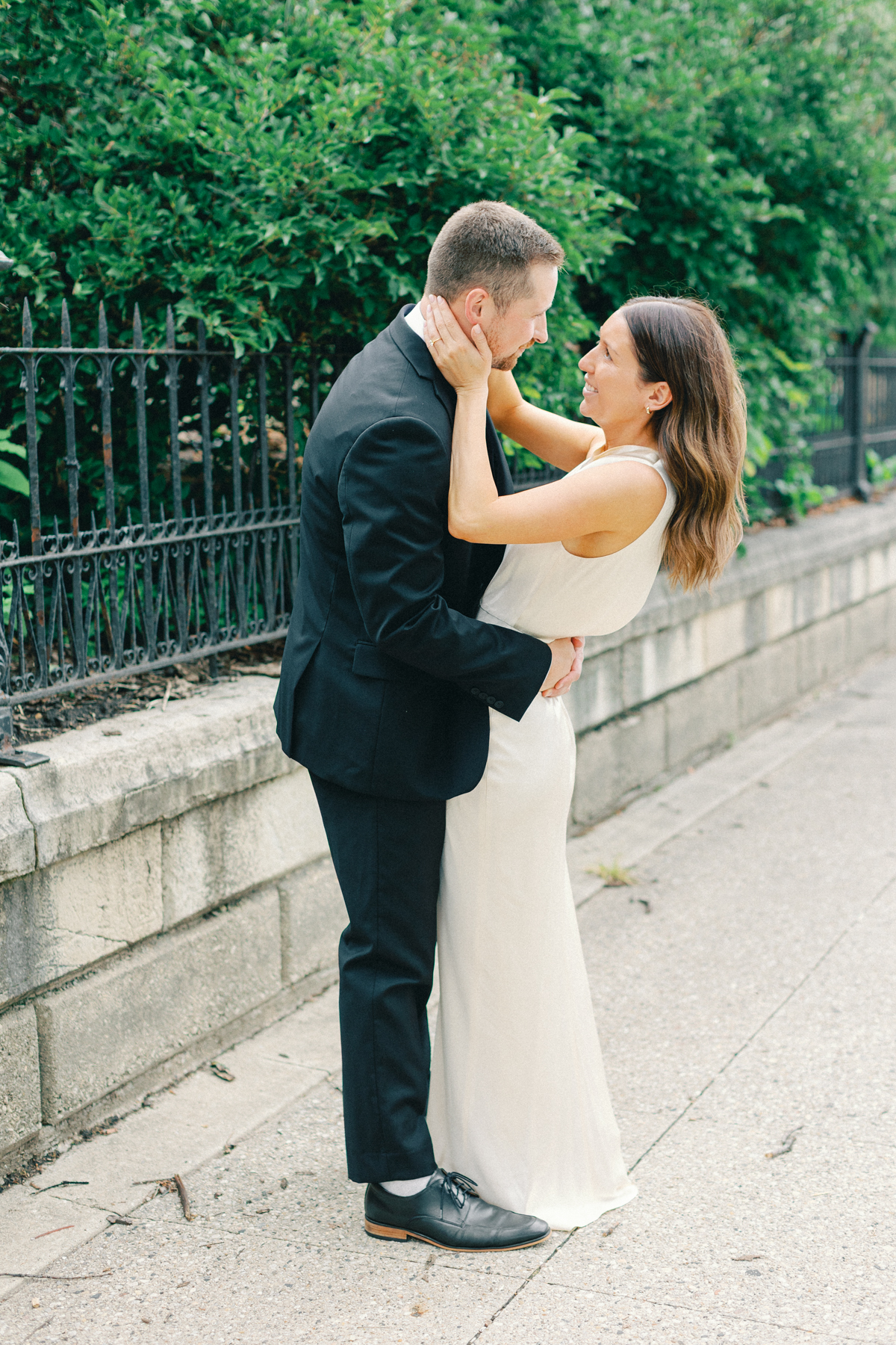 Couple looking at each other outside