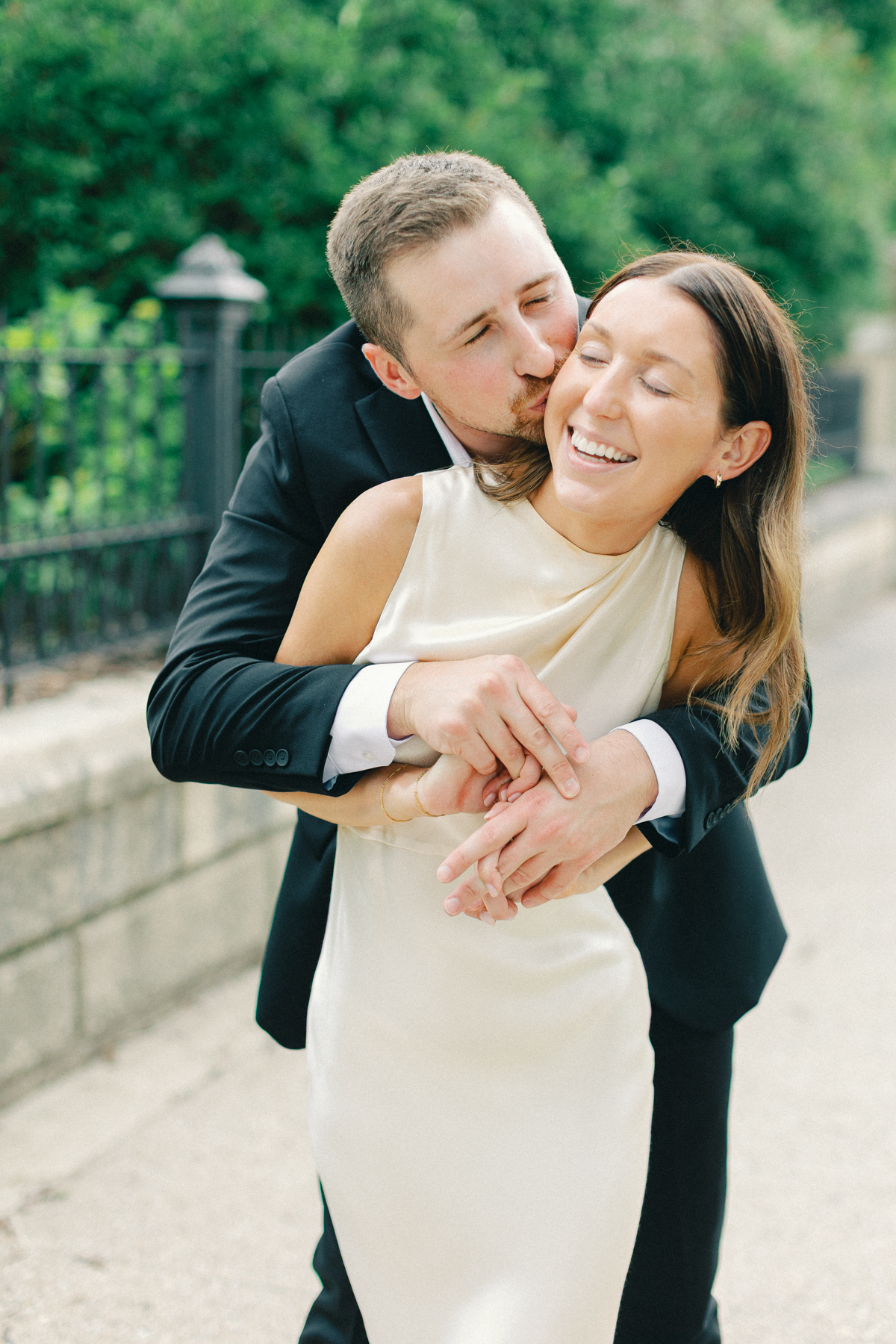Couple laughing and snuggled