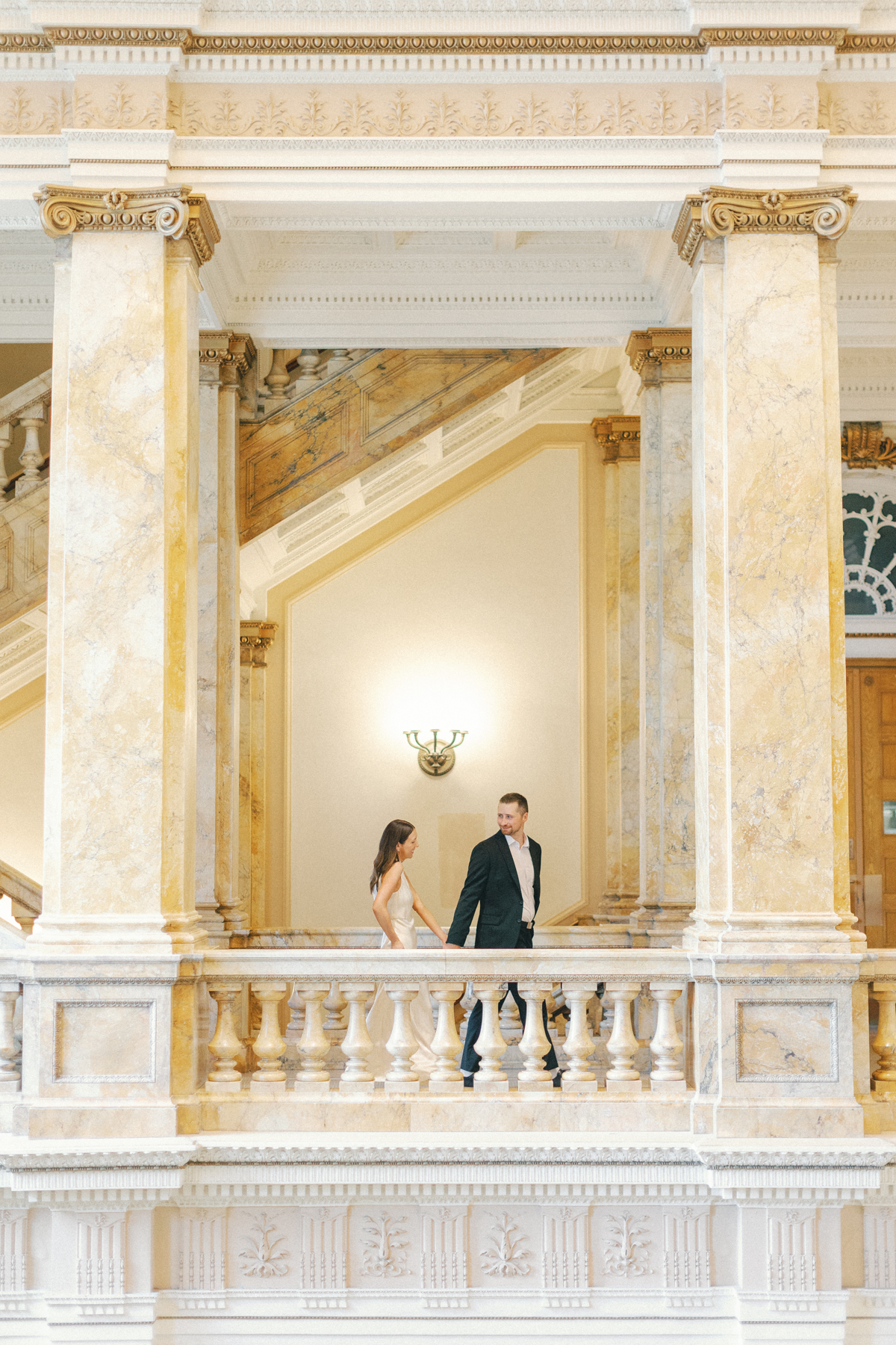 Couple walking inside library