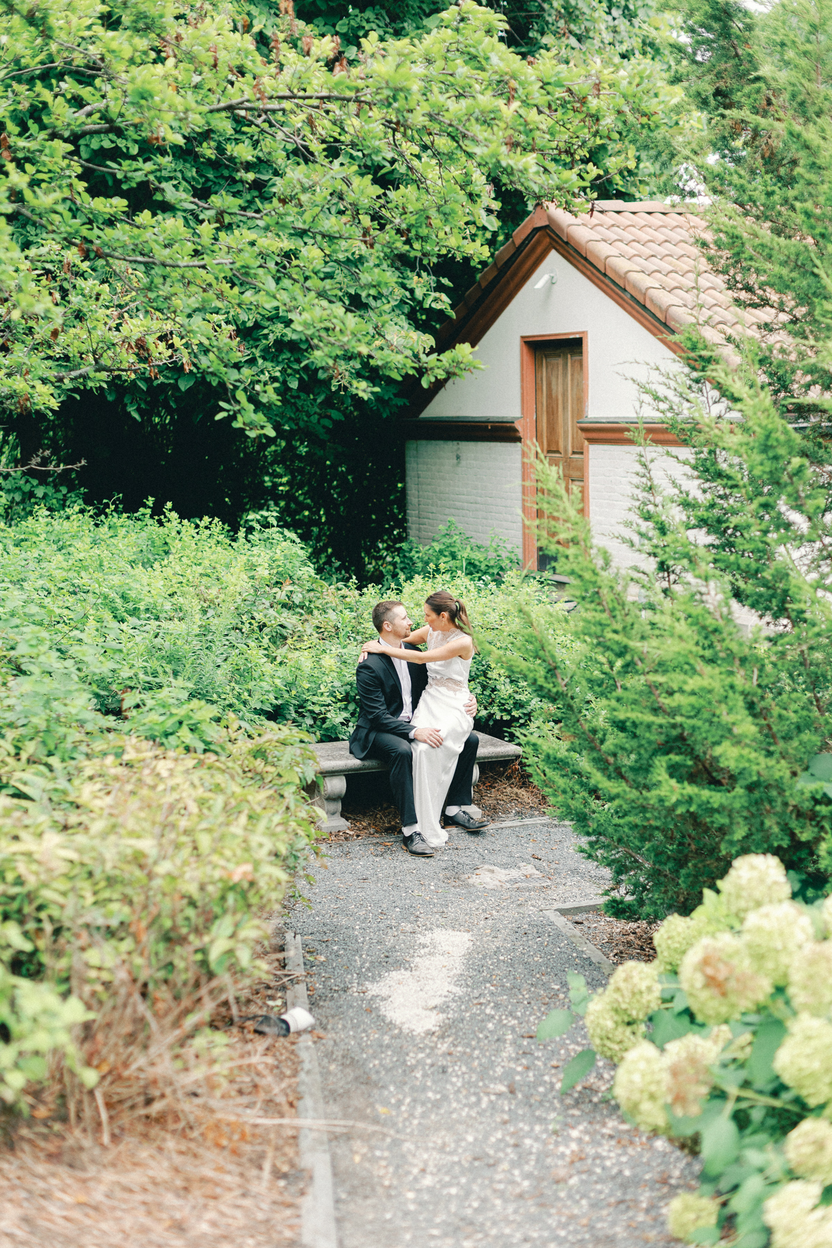 Couple sitting on garden bench
