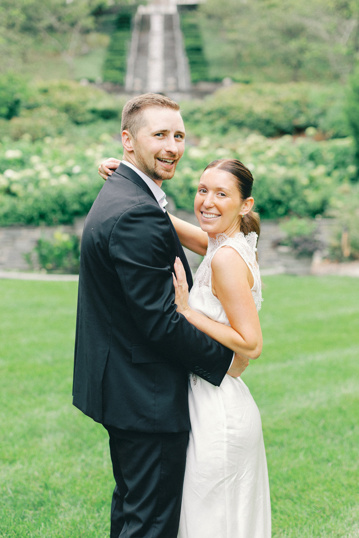 Couple looking at camera, smiling