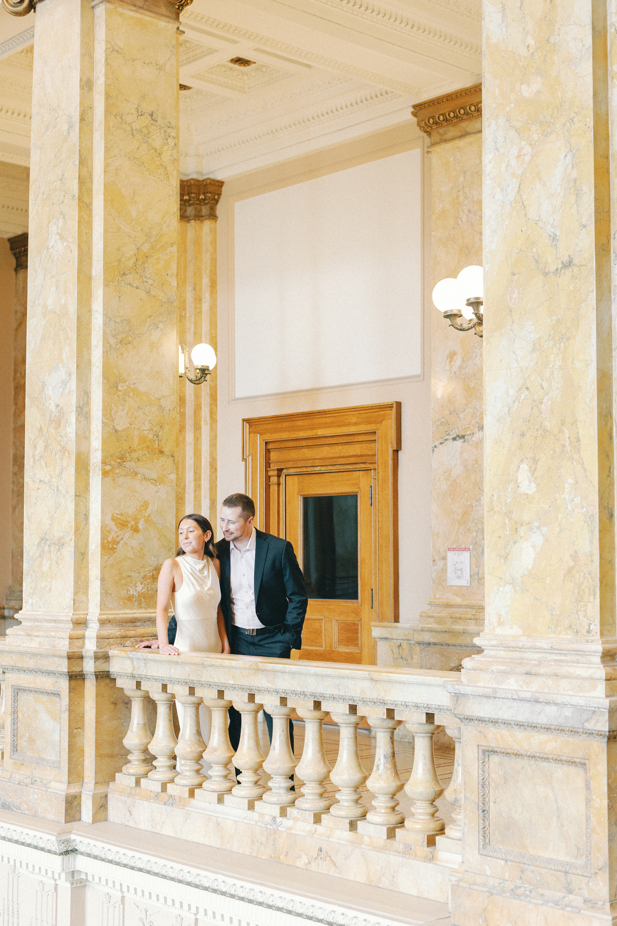 Couple looking around at library