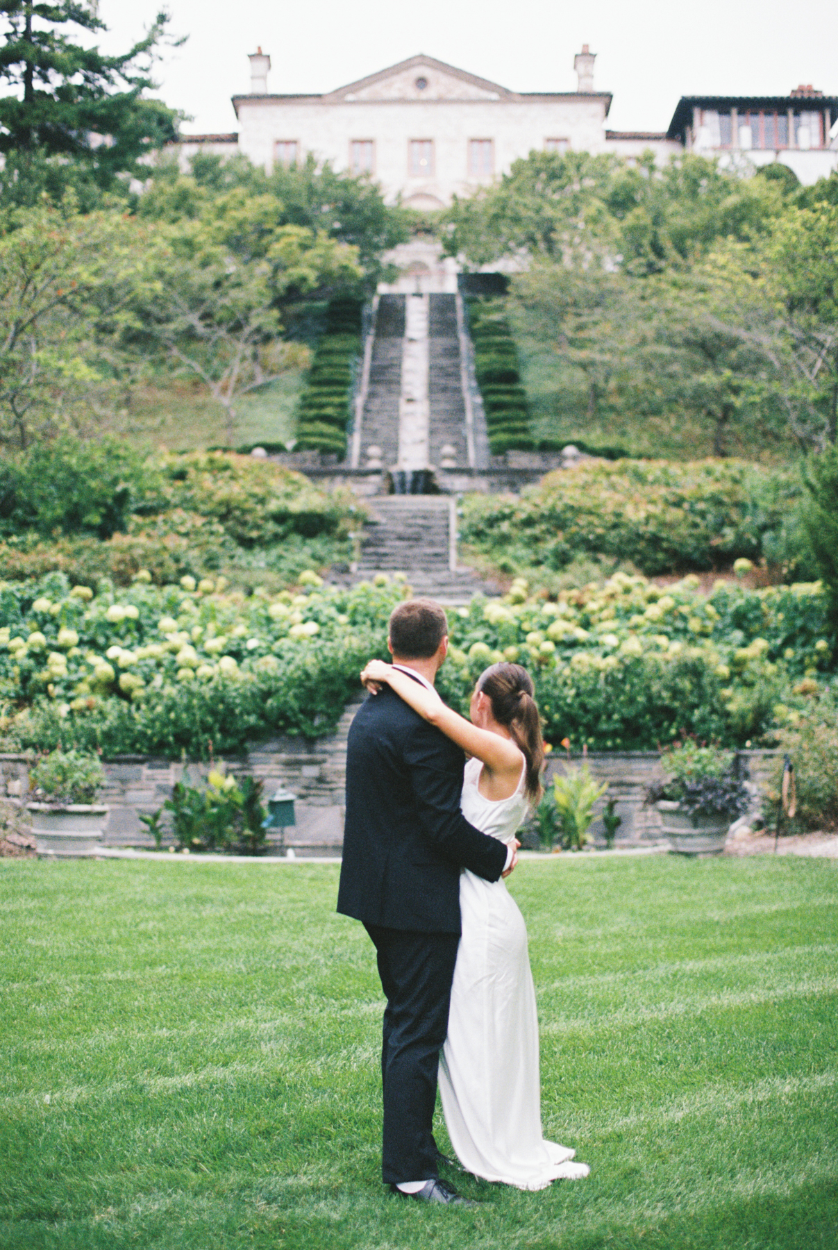 Couple out of focus with villa Terrace focus