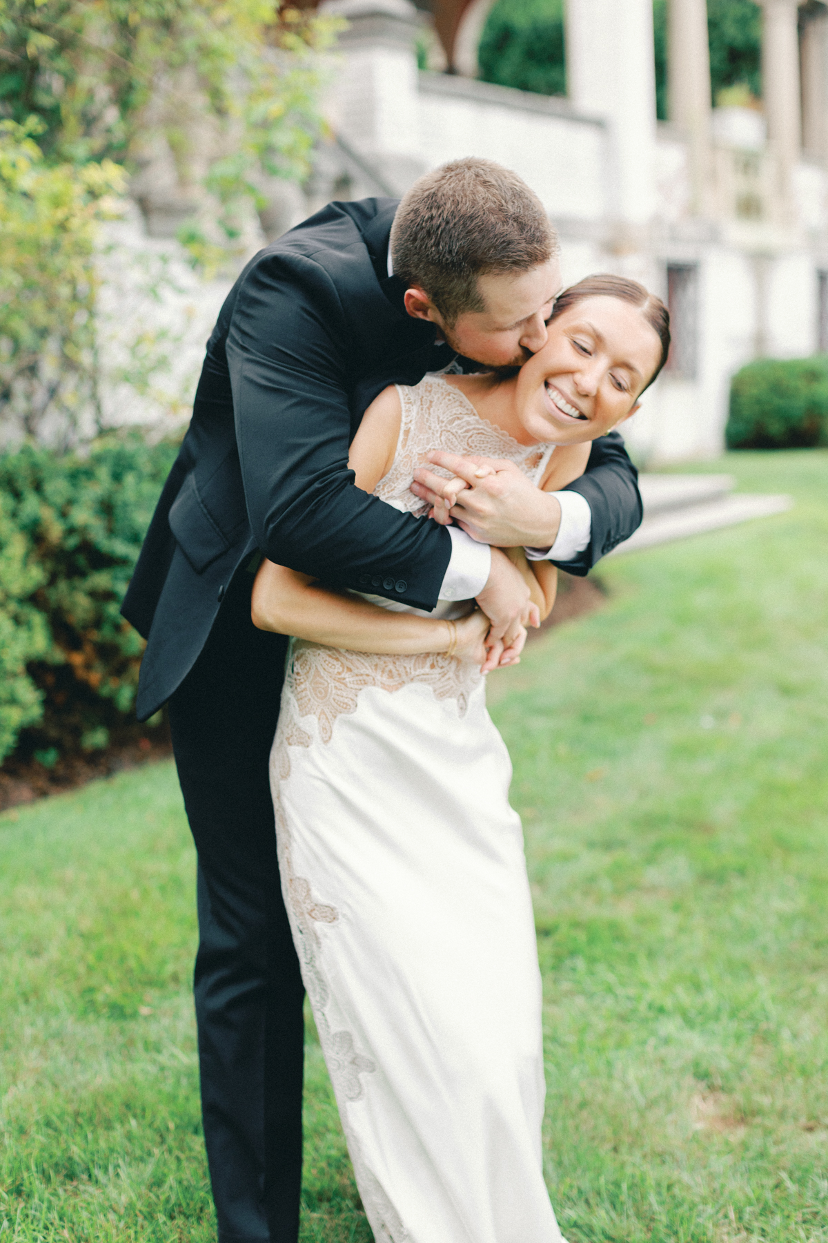 Couple sneak kiss