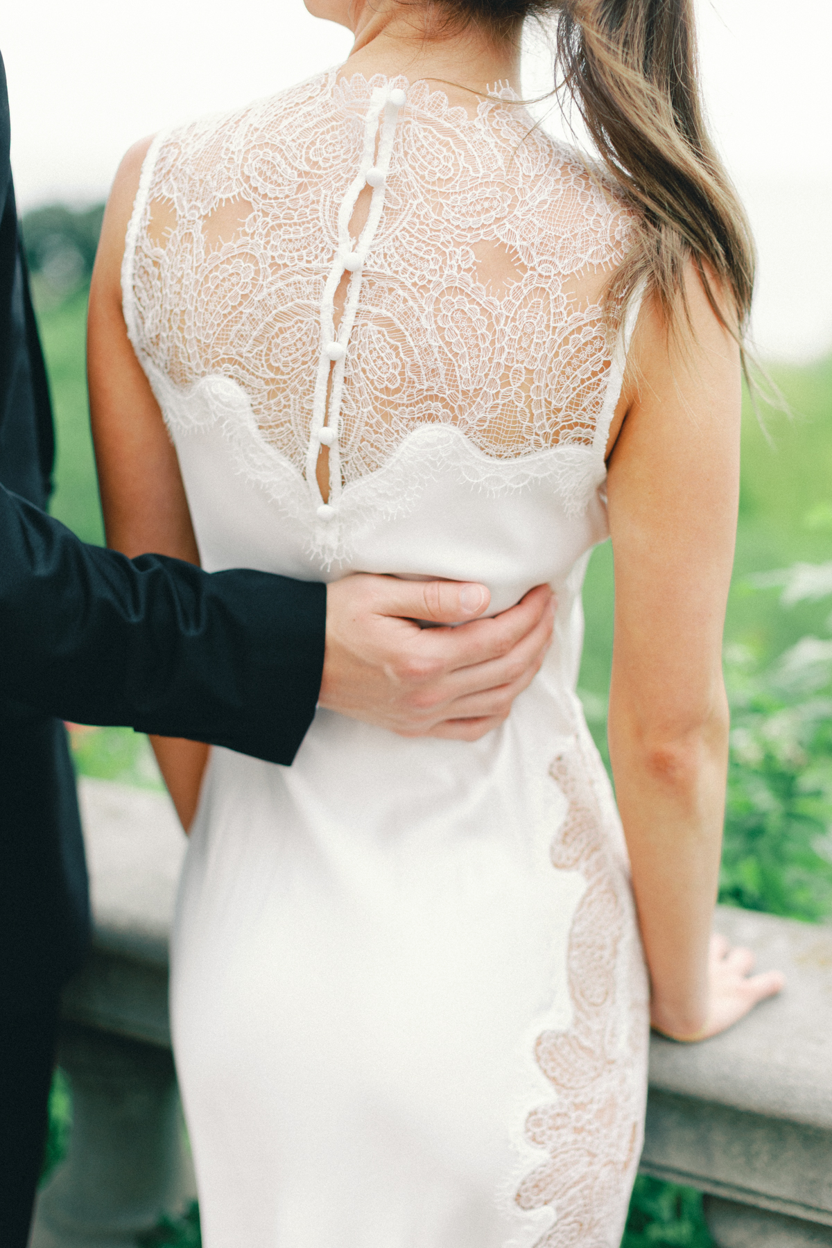 His hand on her dress