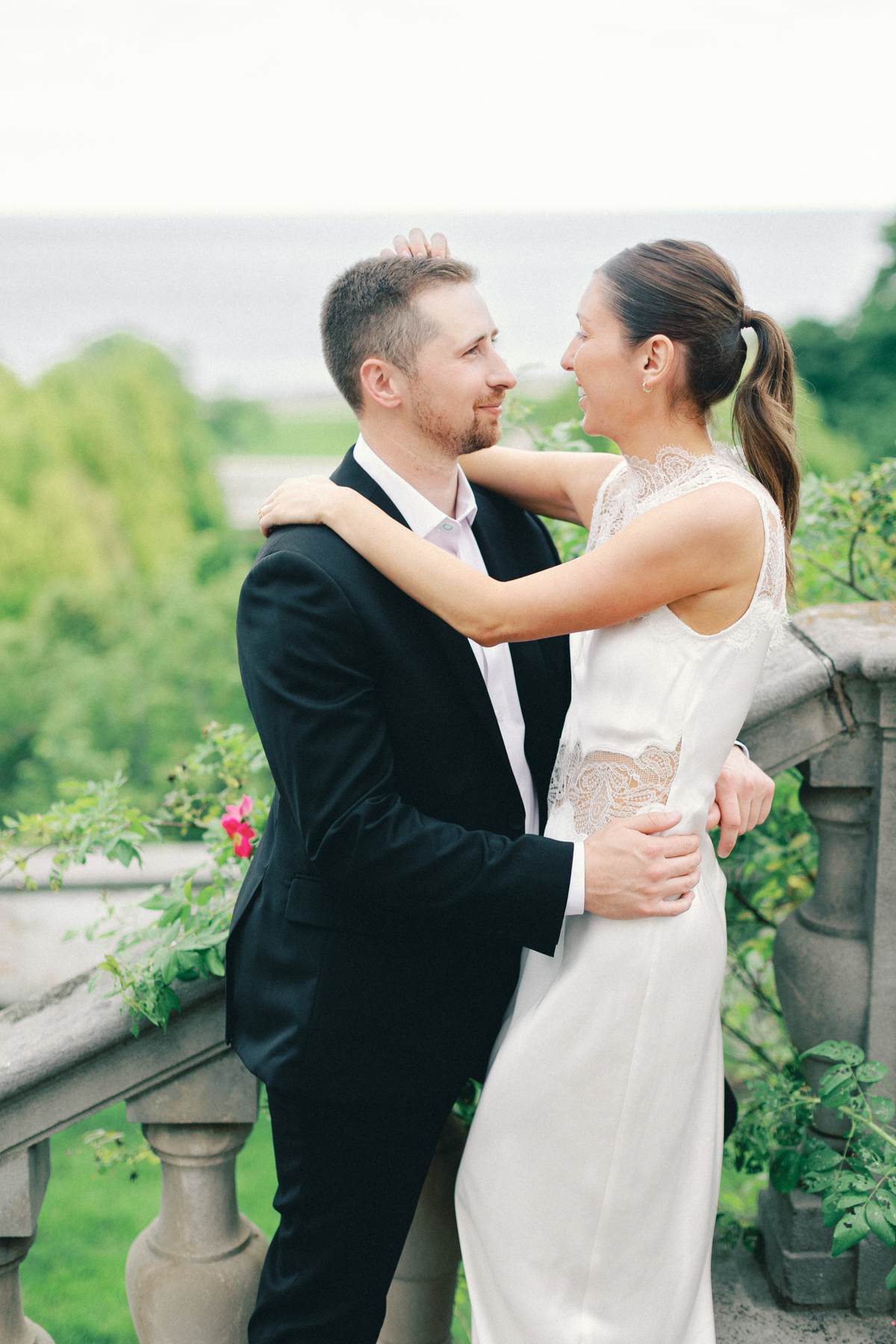 Couple sitting on the staircase up close
