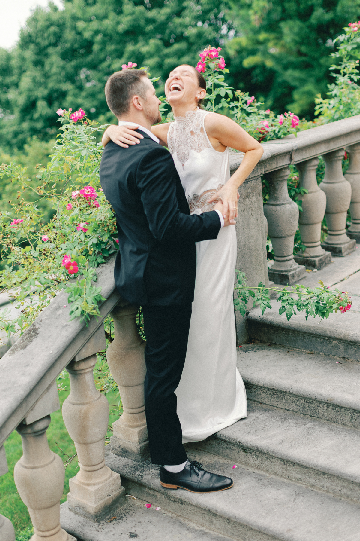 Couple on stair staircase, laughing
