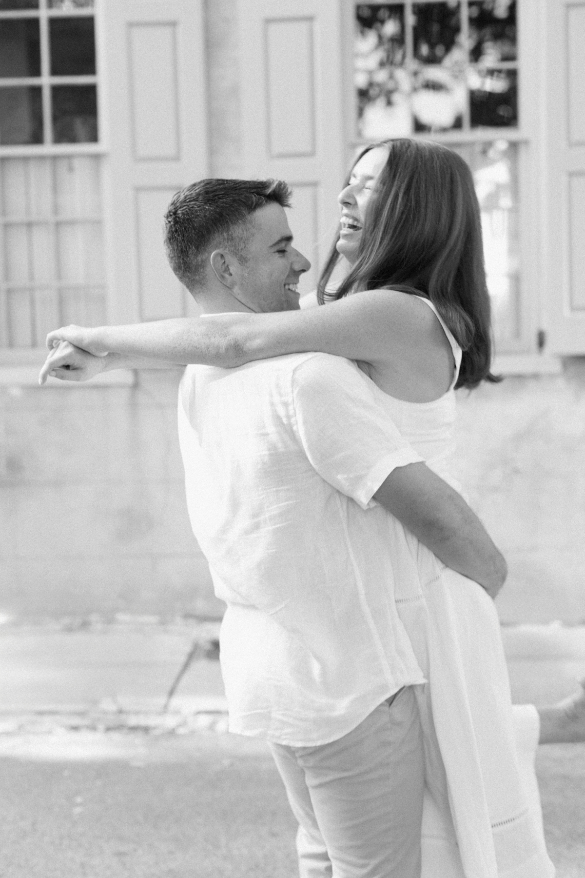 Him picking up her black-and-white