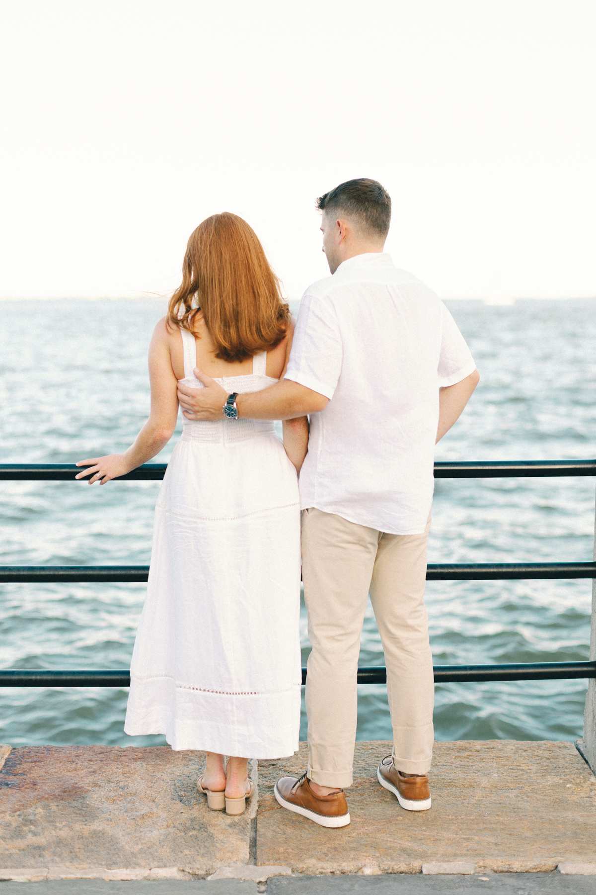 Couple looking out at water