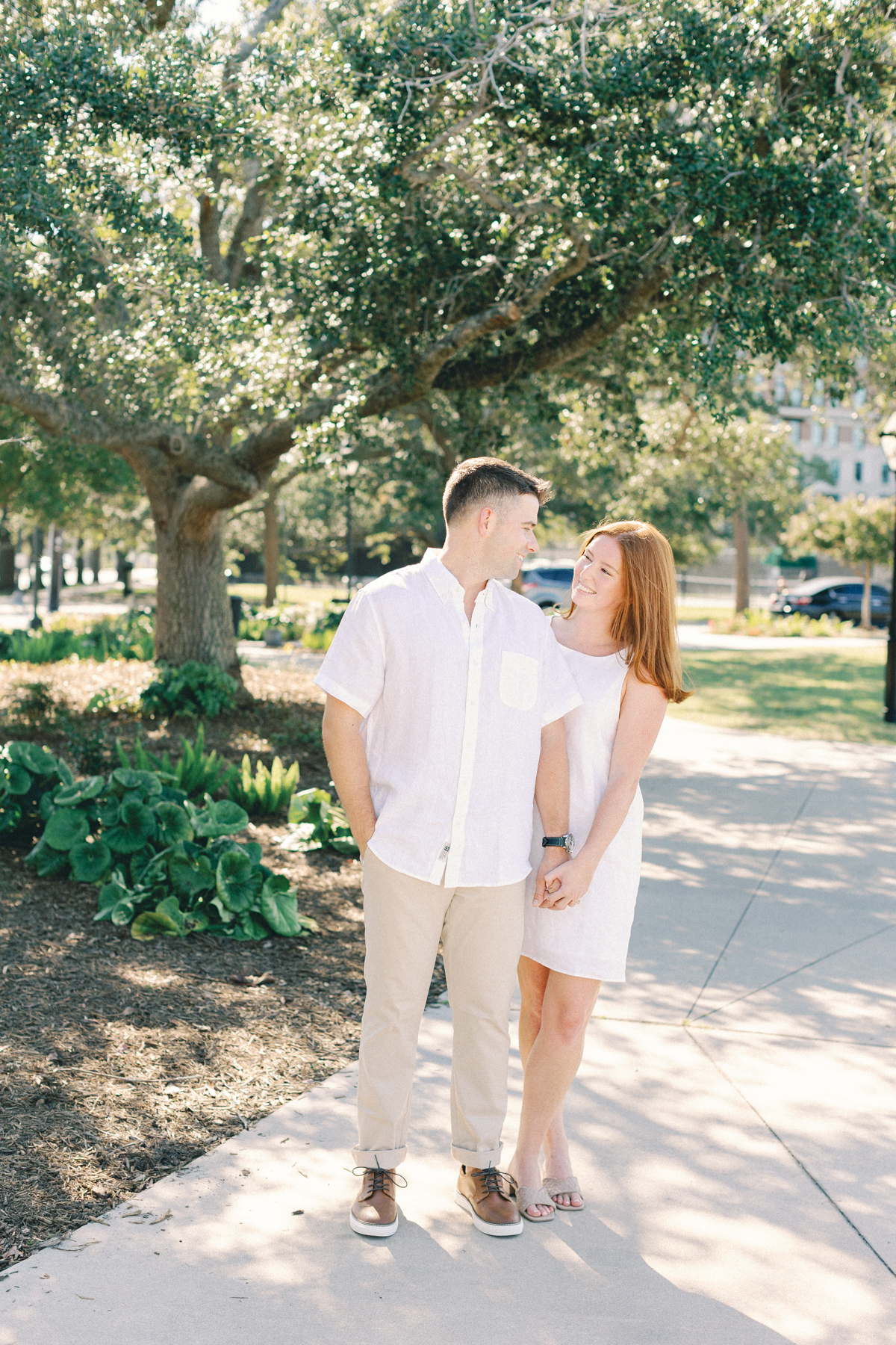 Couple looking at each other in park
