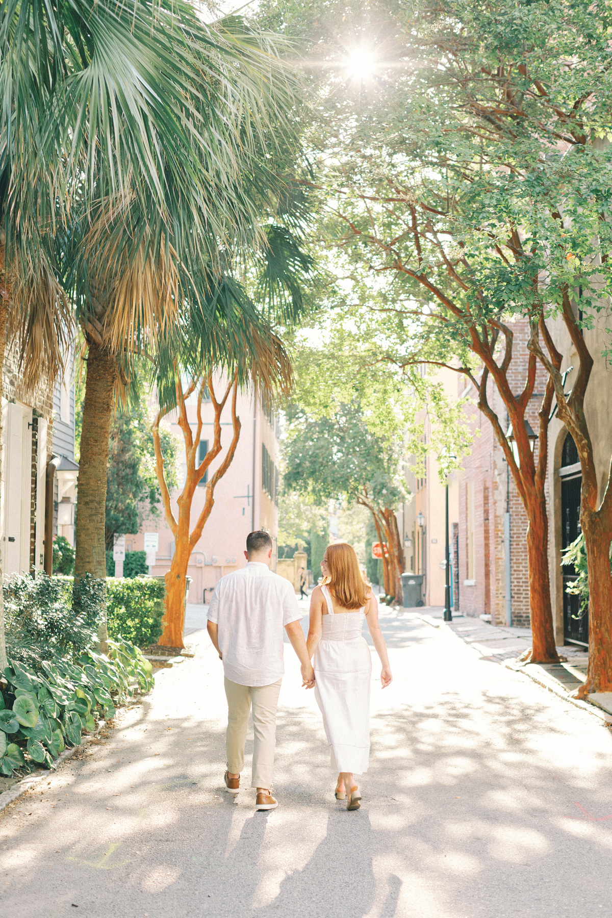 Couple walking away from camera