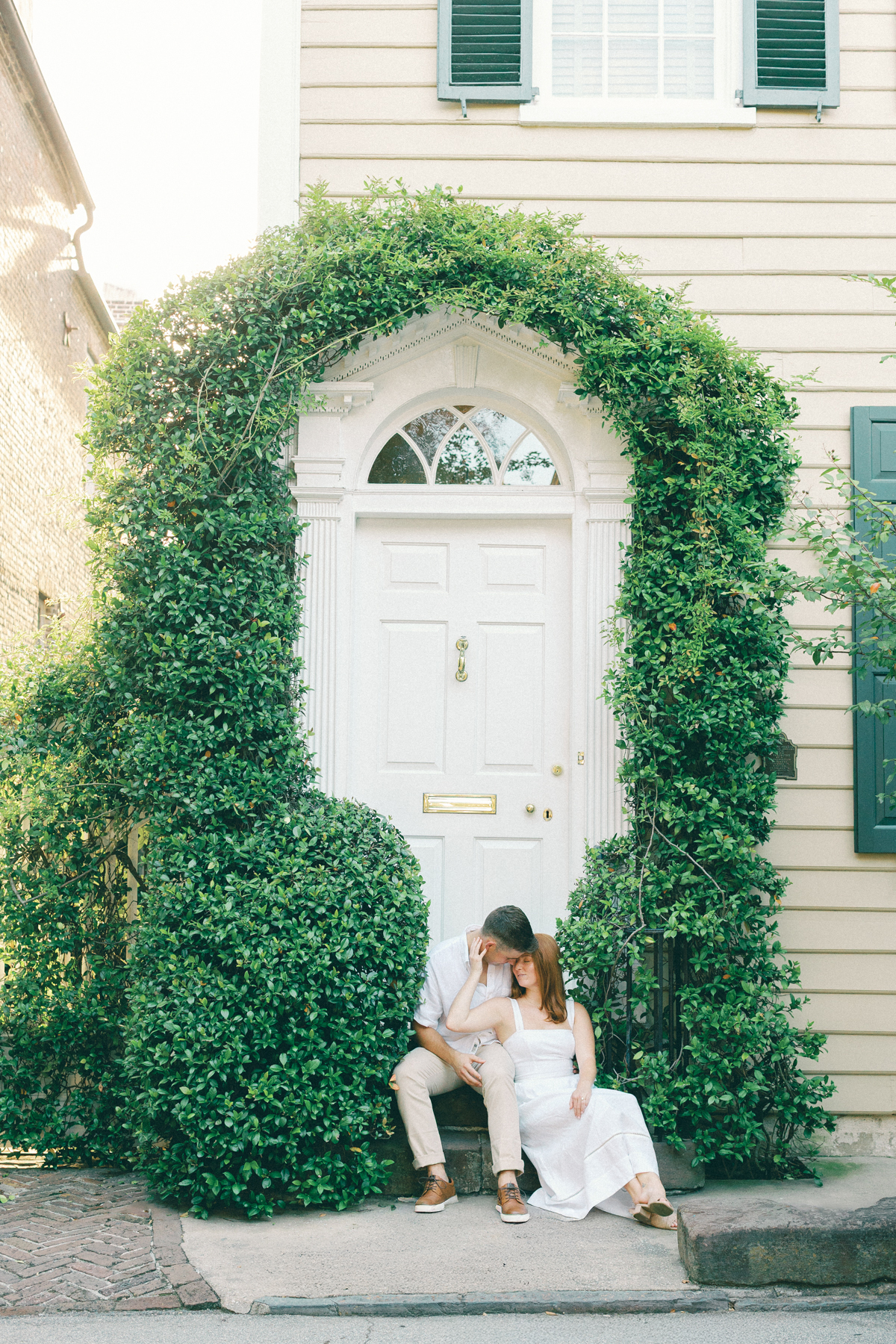 Couple seated on porch