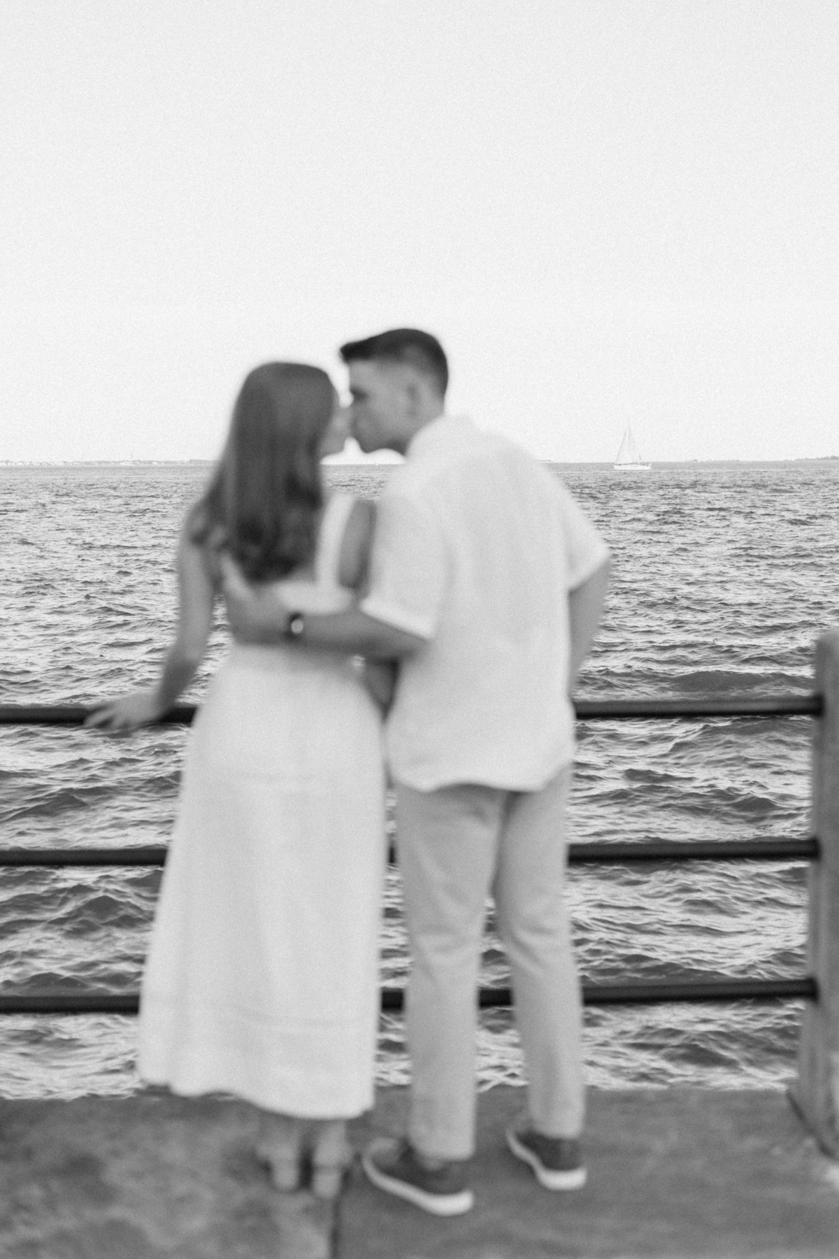 Black-and-white photo of couple out of focus