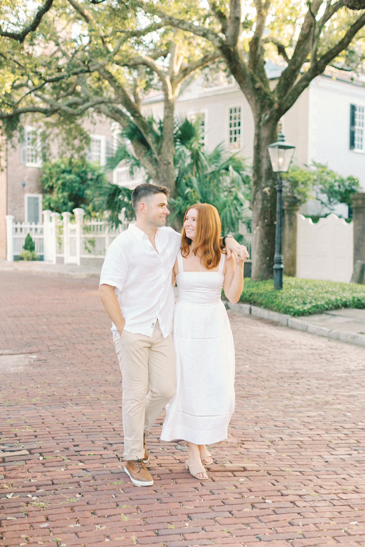 Couple stumbling towards camera