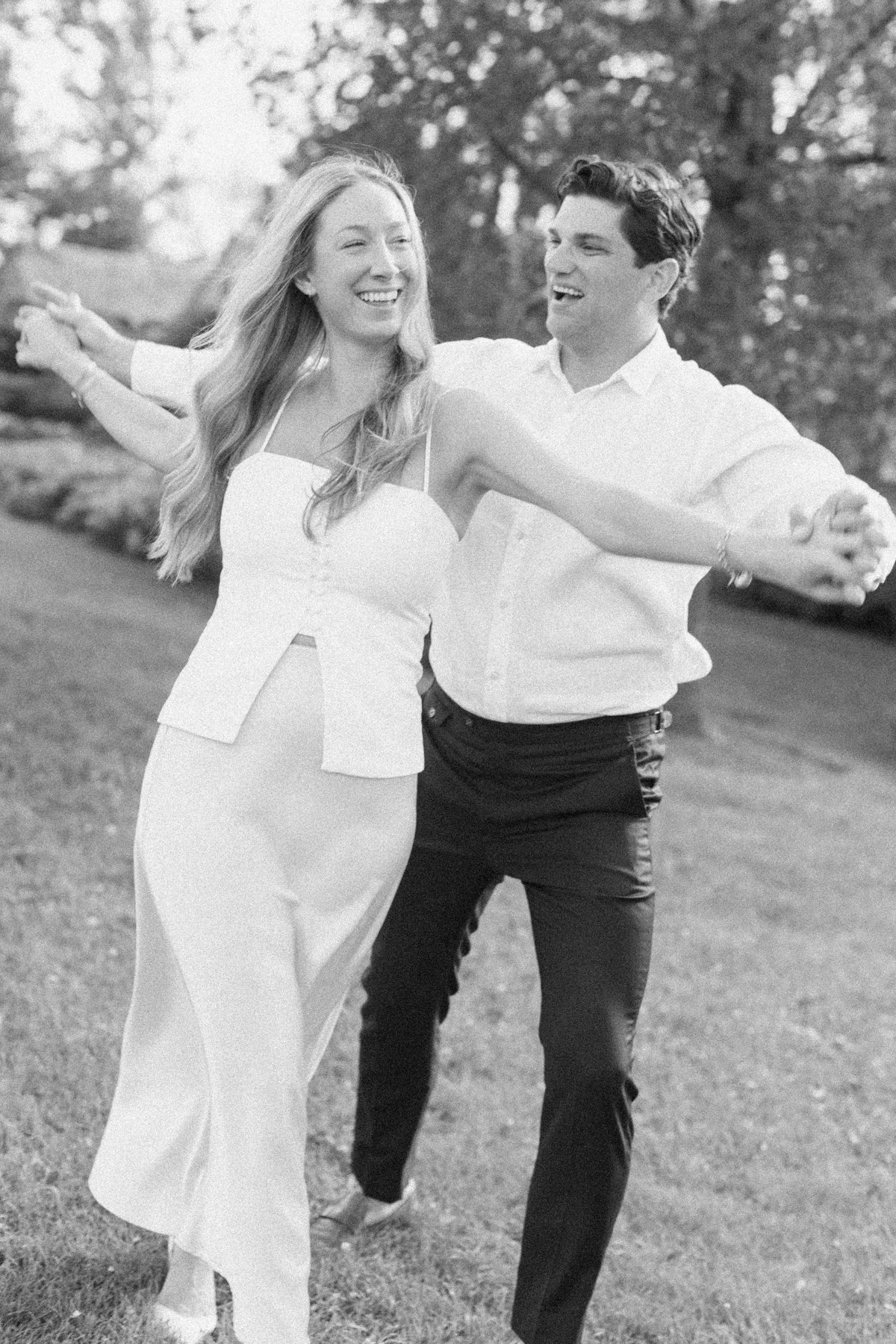 Couple laughing and holding each other