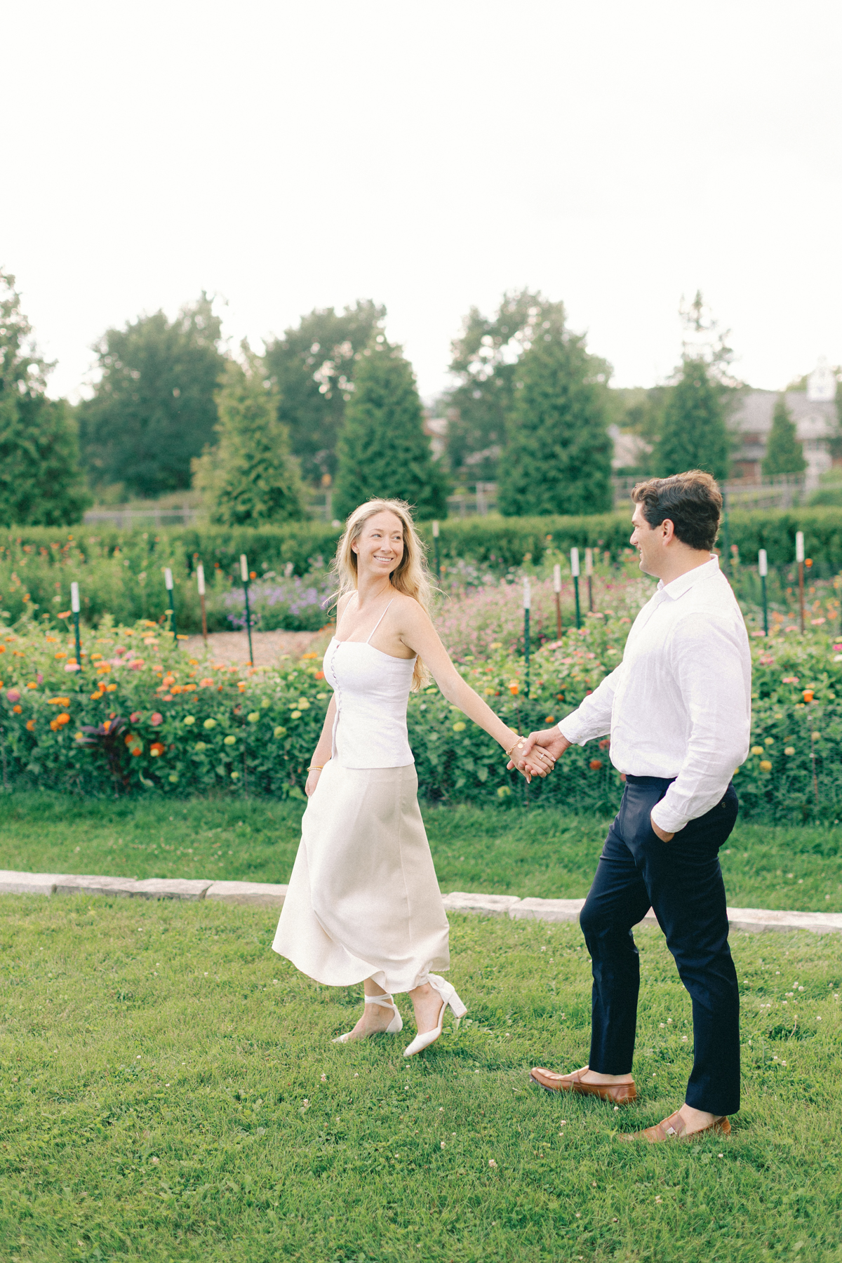 Couple walking in garden