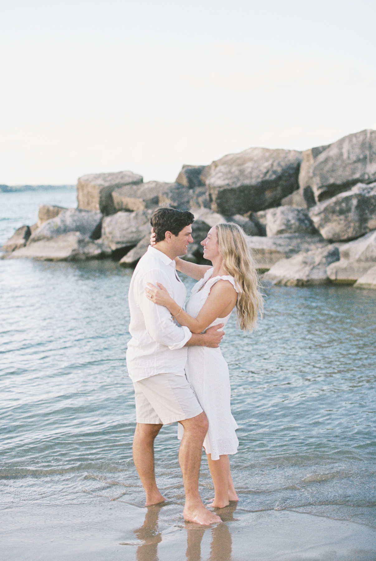 Couple looking at each other on beach