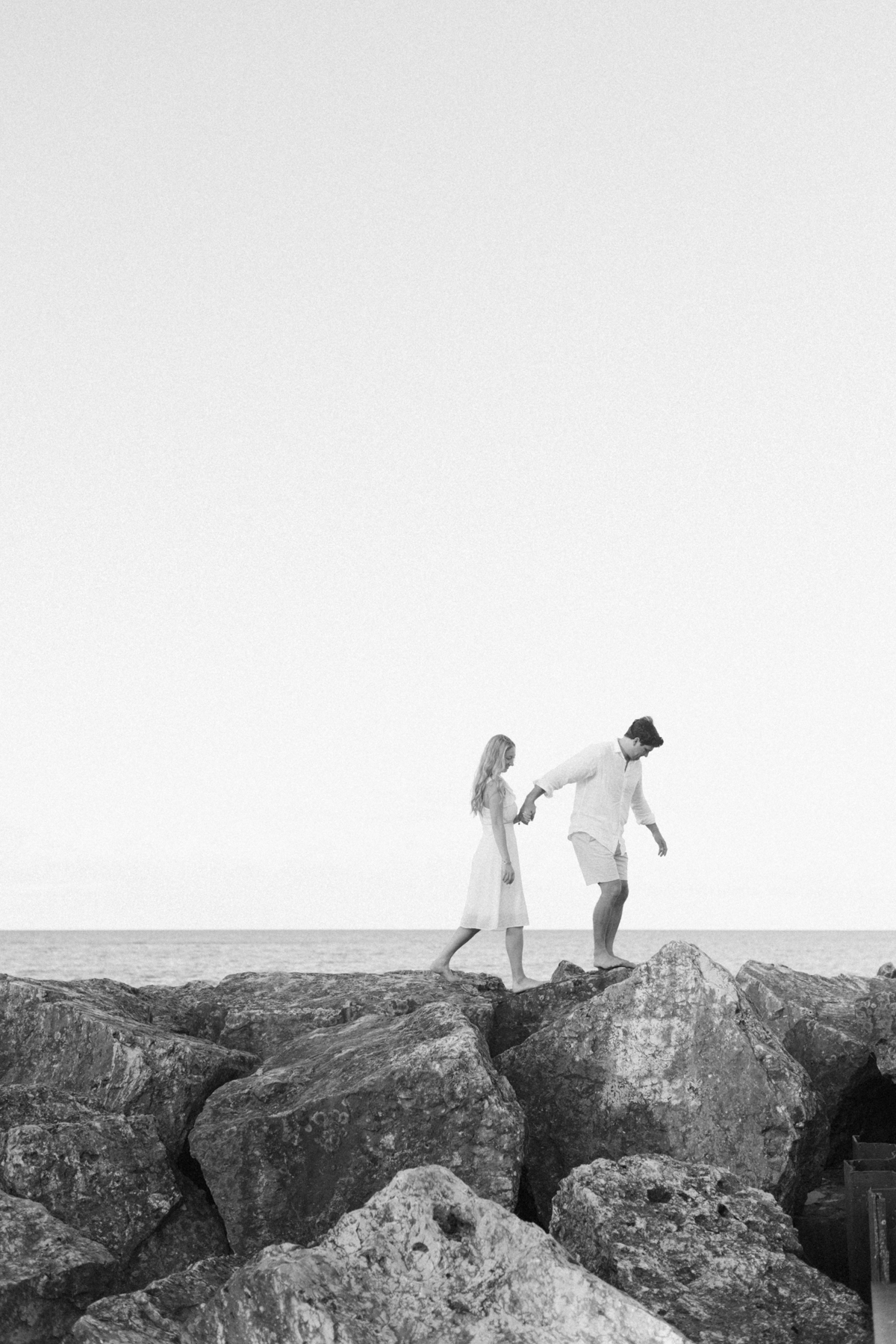 Couple walking the rocks