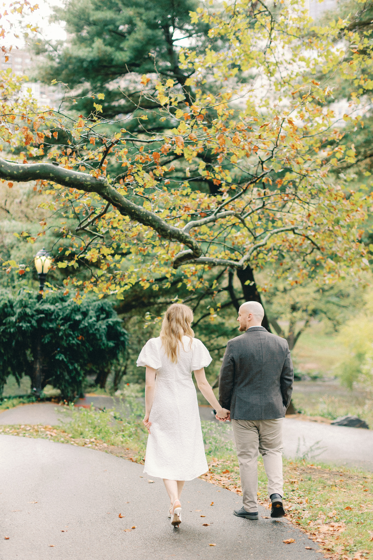 Couple walking away from camera