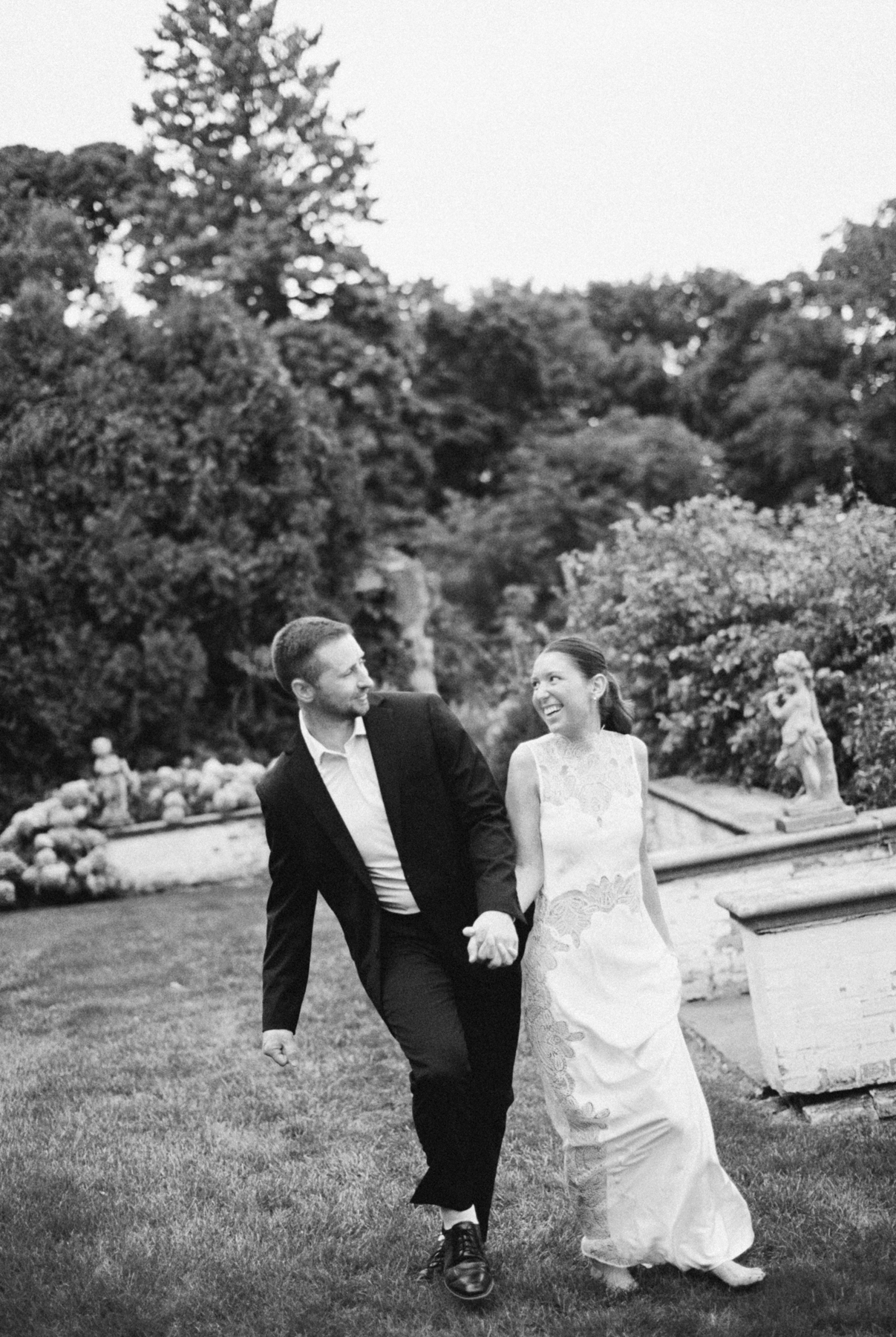 Couple walking and laughing black-and-white