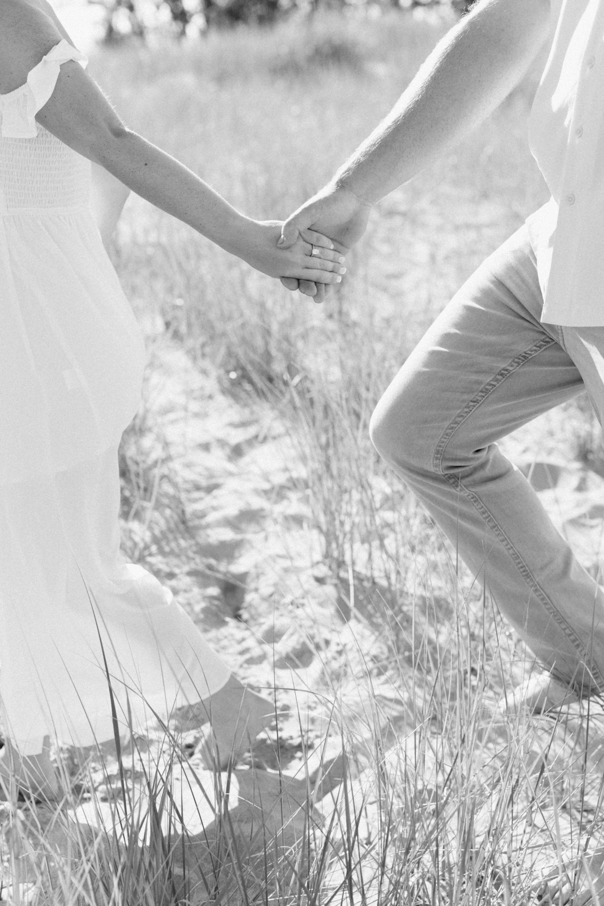 Couple holding hands