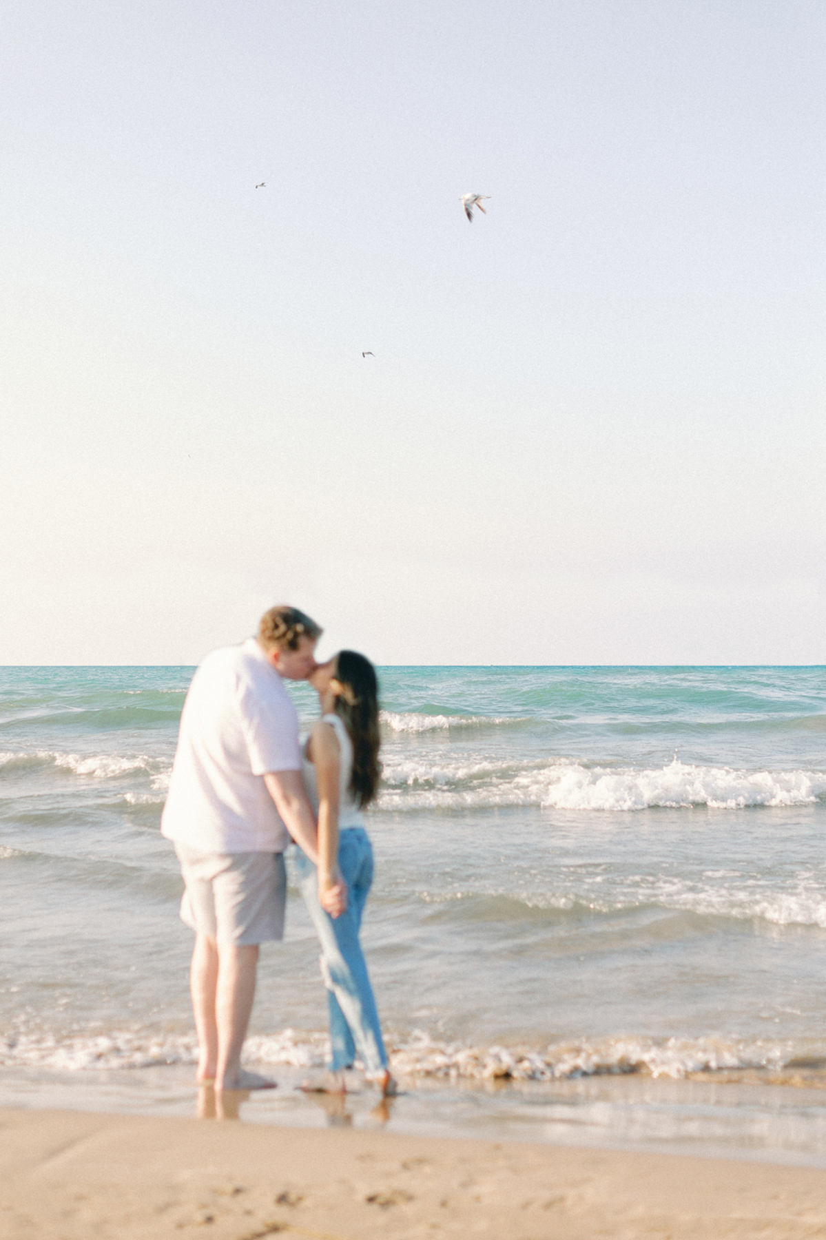 Couple kissing on beach