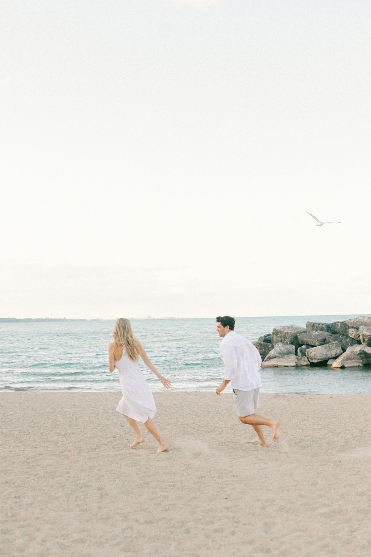Couple chasing each other