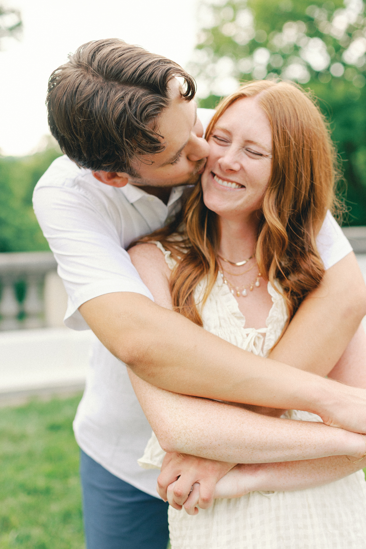 Couple snuggling and laughing