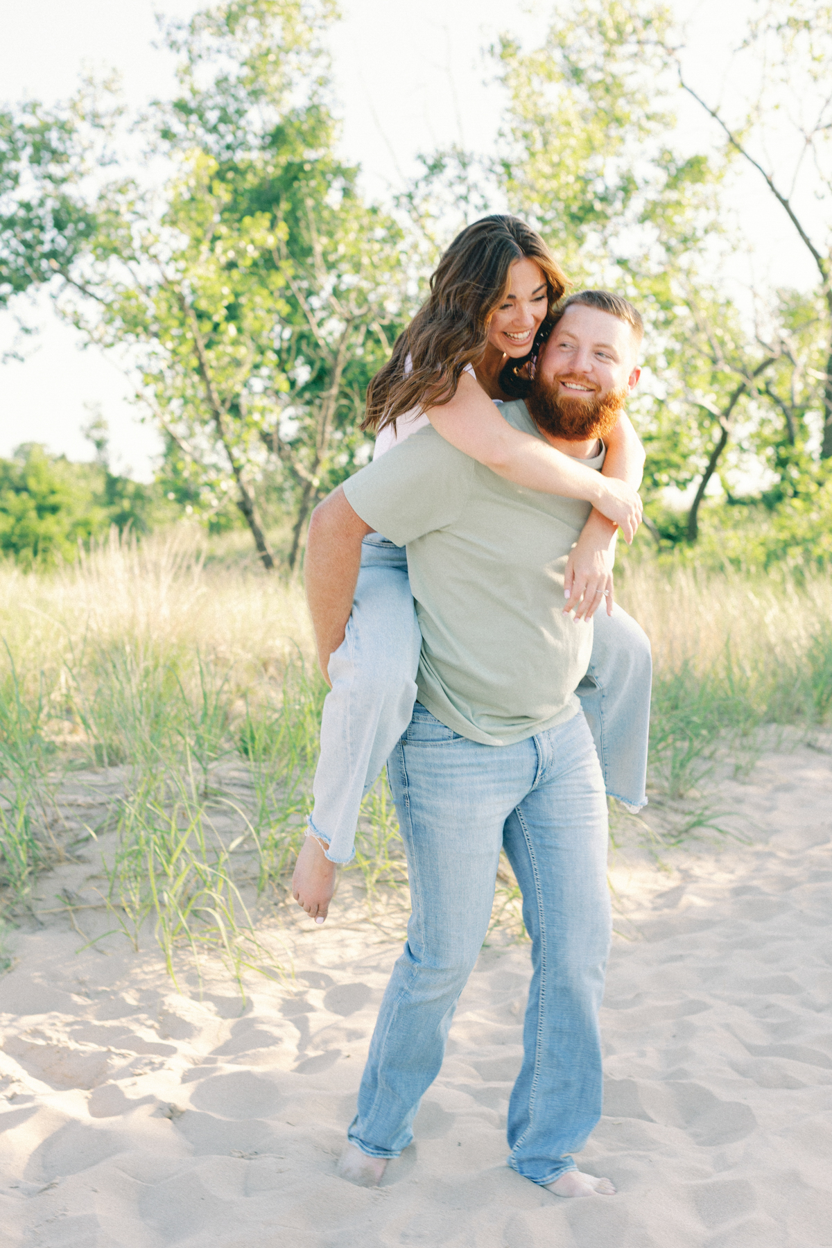 Couple playing in the sand