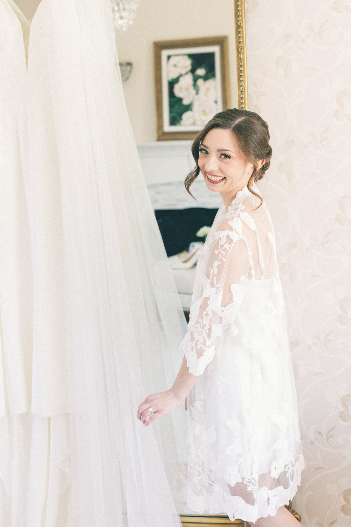 Bride admiring her dress