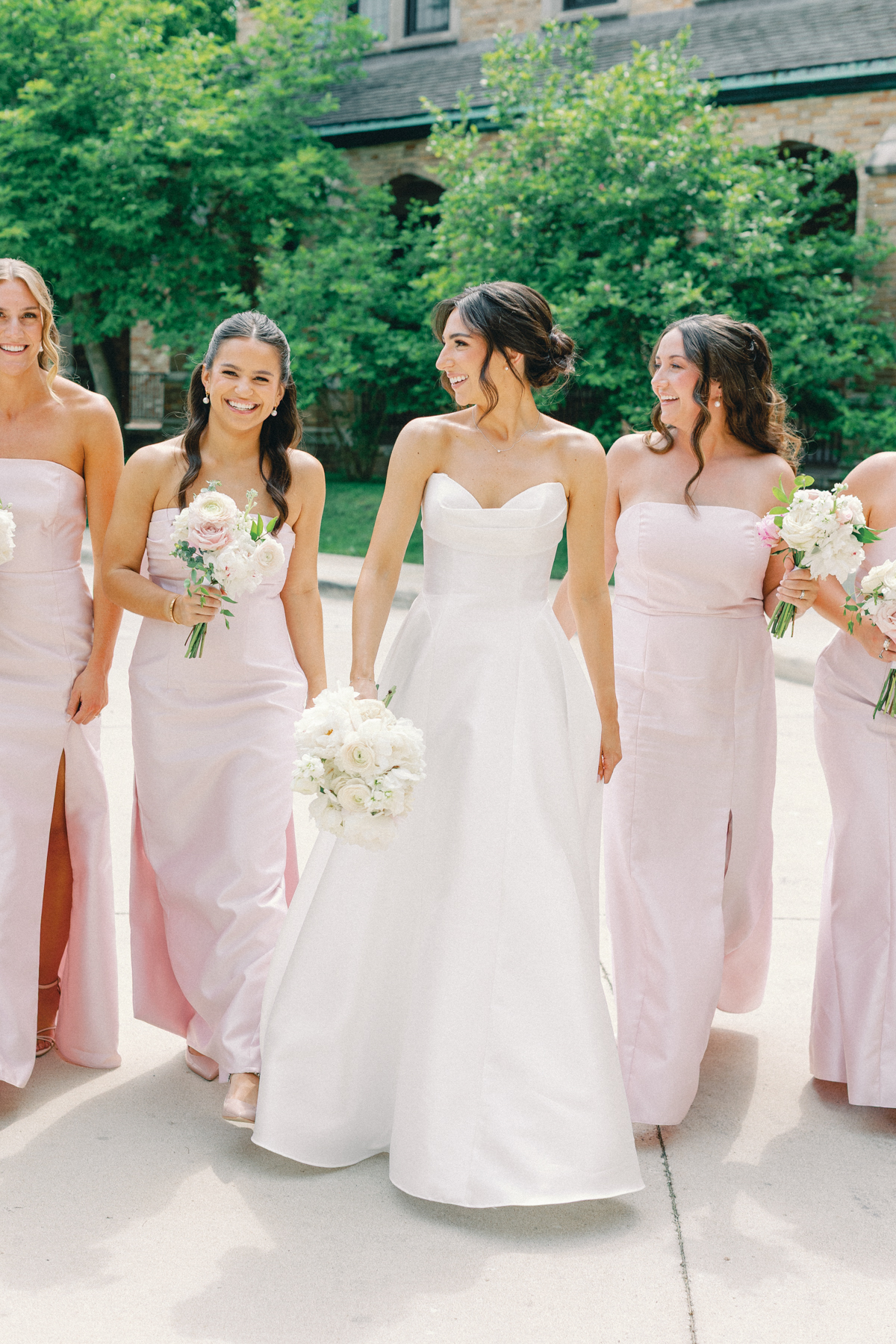 Bridesmaids, walking and laughing