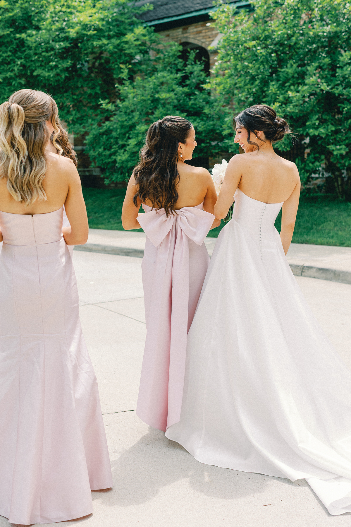 Bride made of honor, hip bump