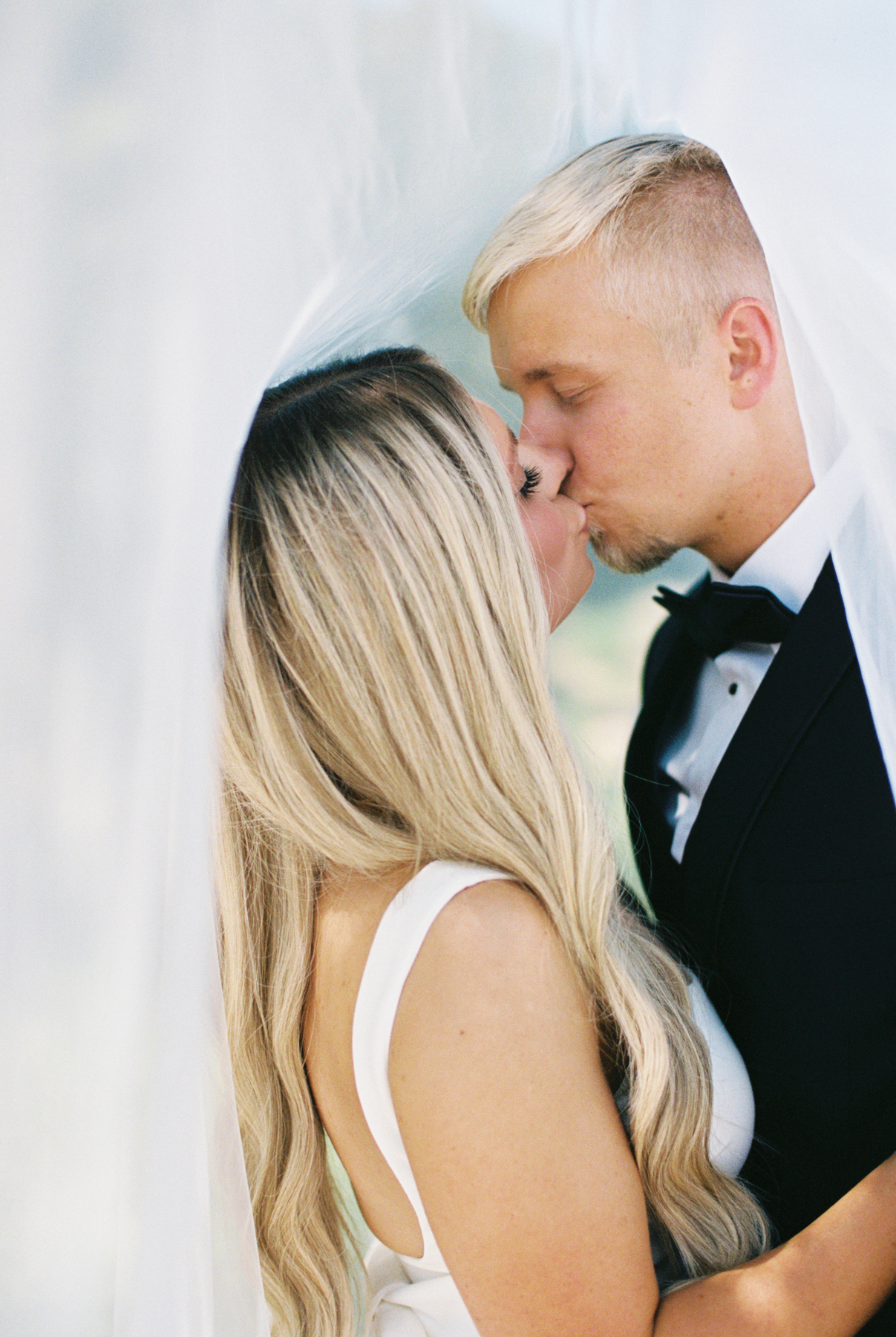 Bride and groom, kissing