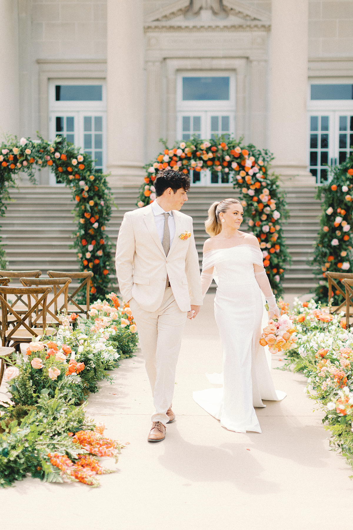 bride and groom walking down aisle