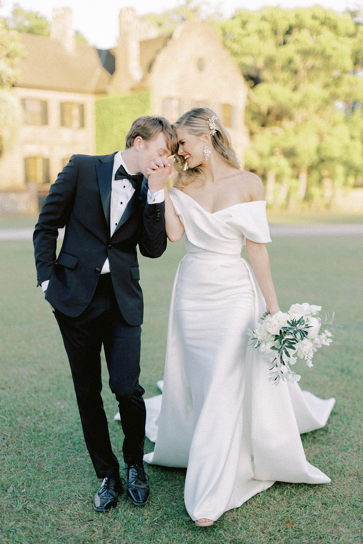 Couple kissing hands