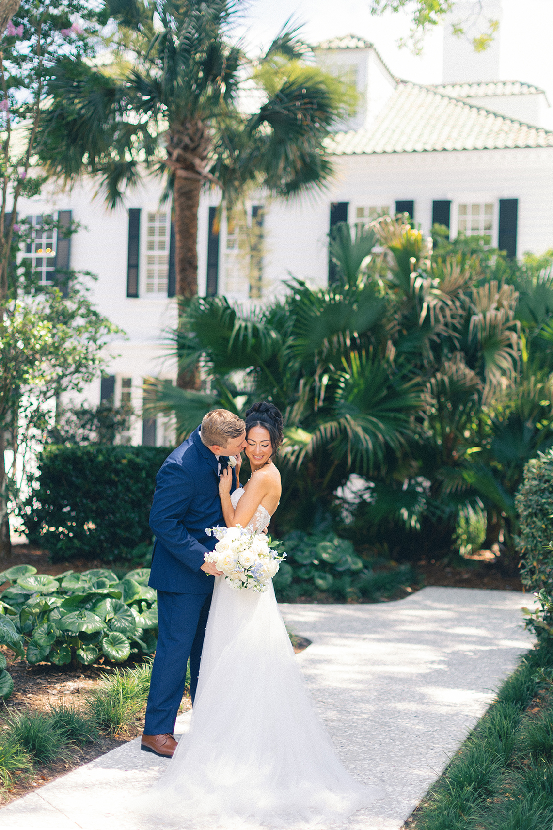couple kissing at venue