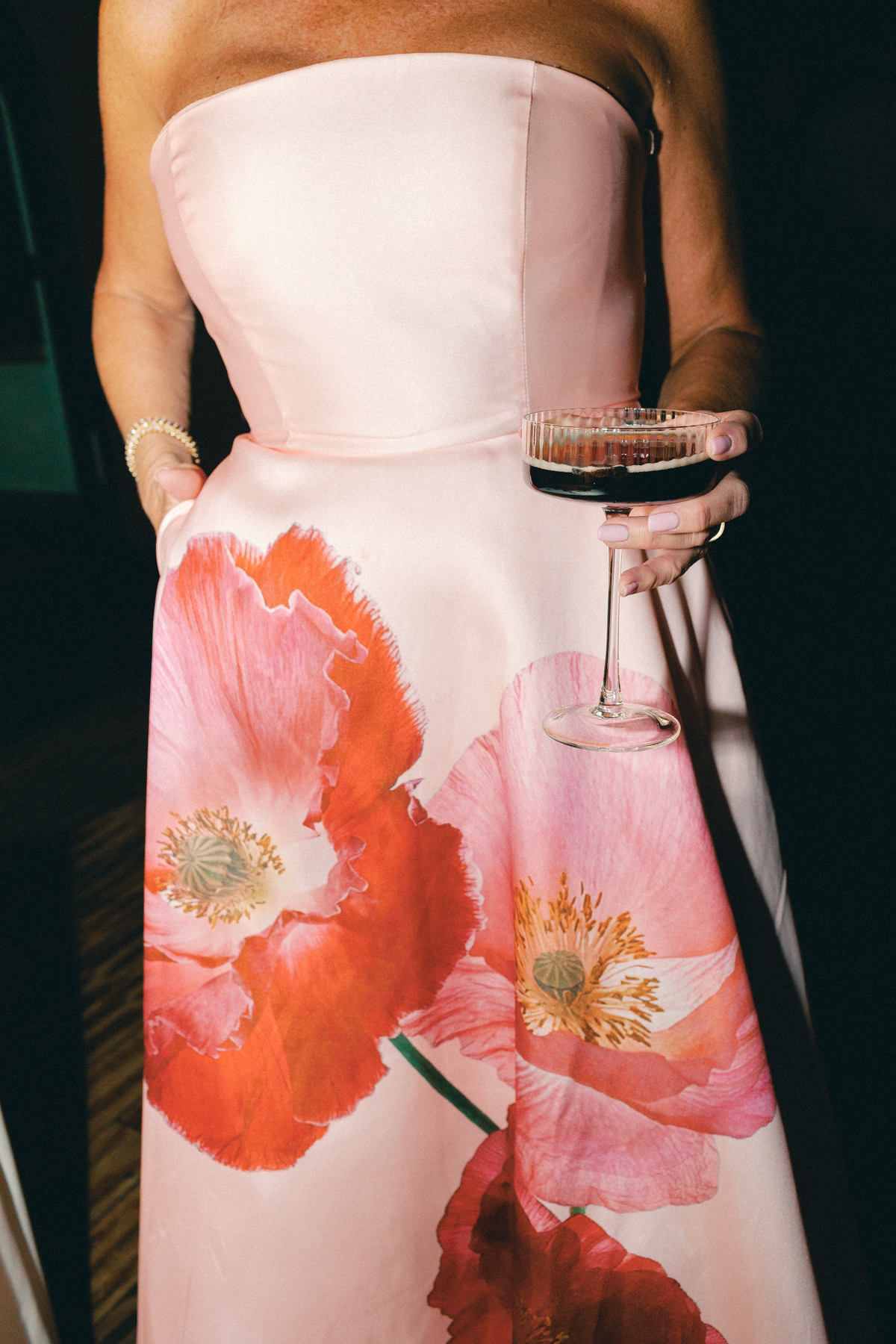 A girl holding espresso martini