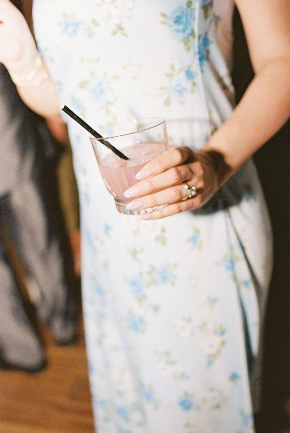 Someone holding a drink